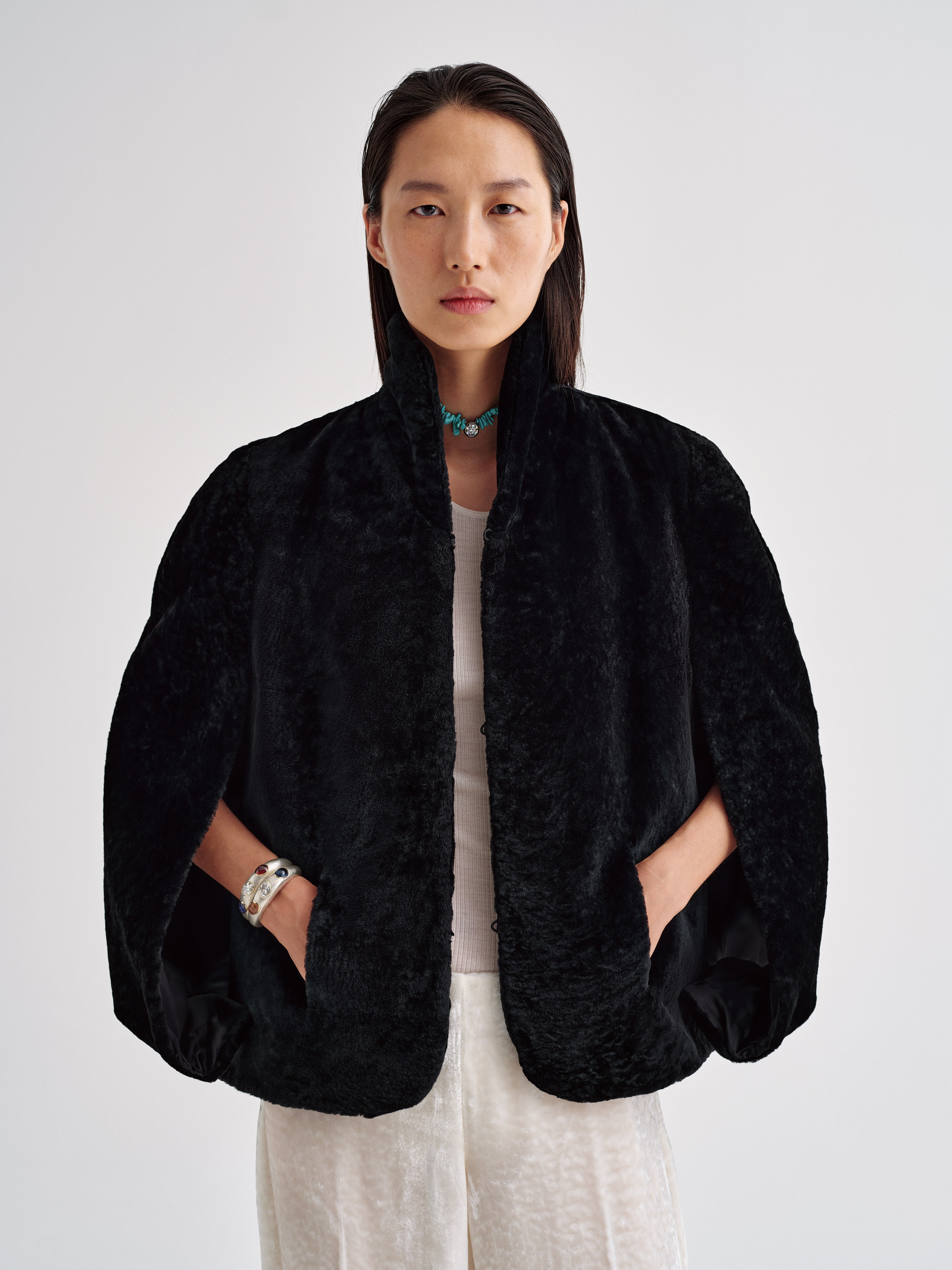 AFLALO Cena Cape in Shearling, Black, front view on model