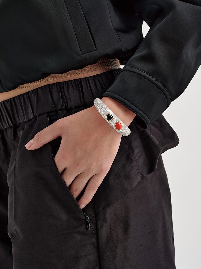 AFLALO Pavé Romani Cuff in Silver, Coral and Black Onyx, close-up on model