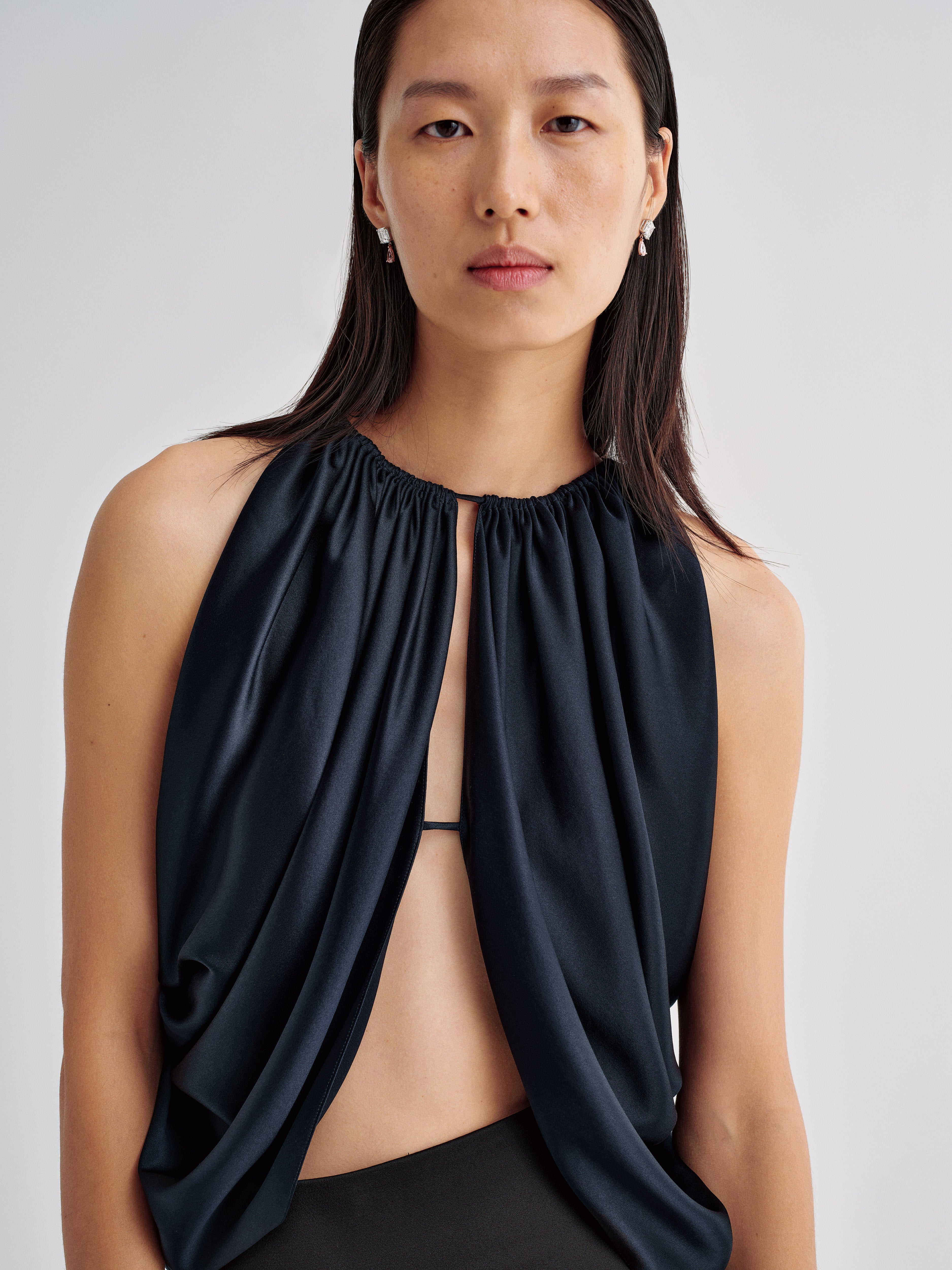 AFLALO Reysa Top in Silk, Midnight, close-up on model