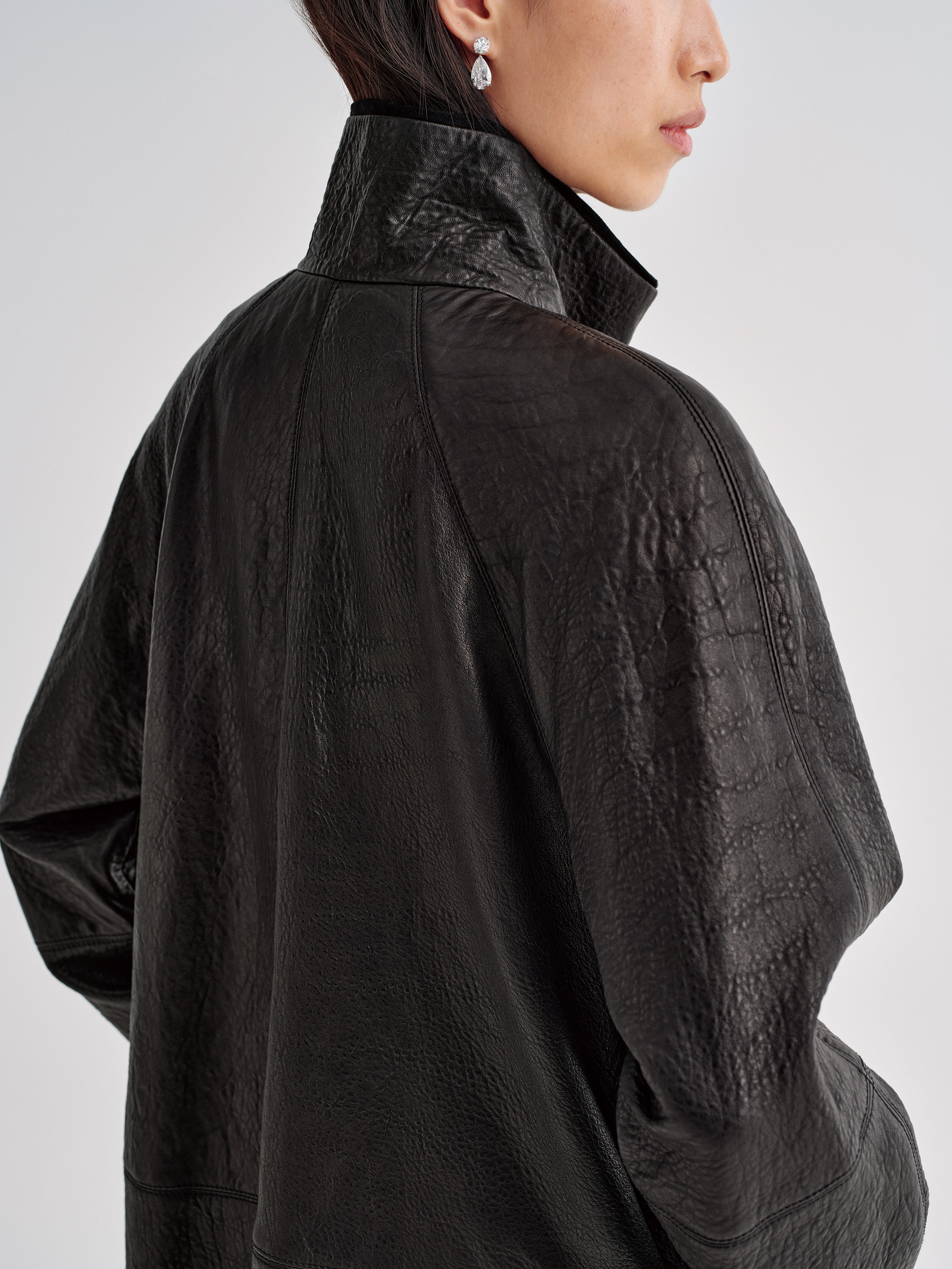 AFLALO Vanta Jacket in Black, close-up on model