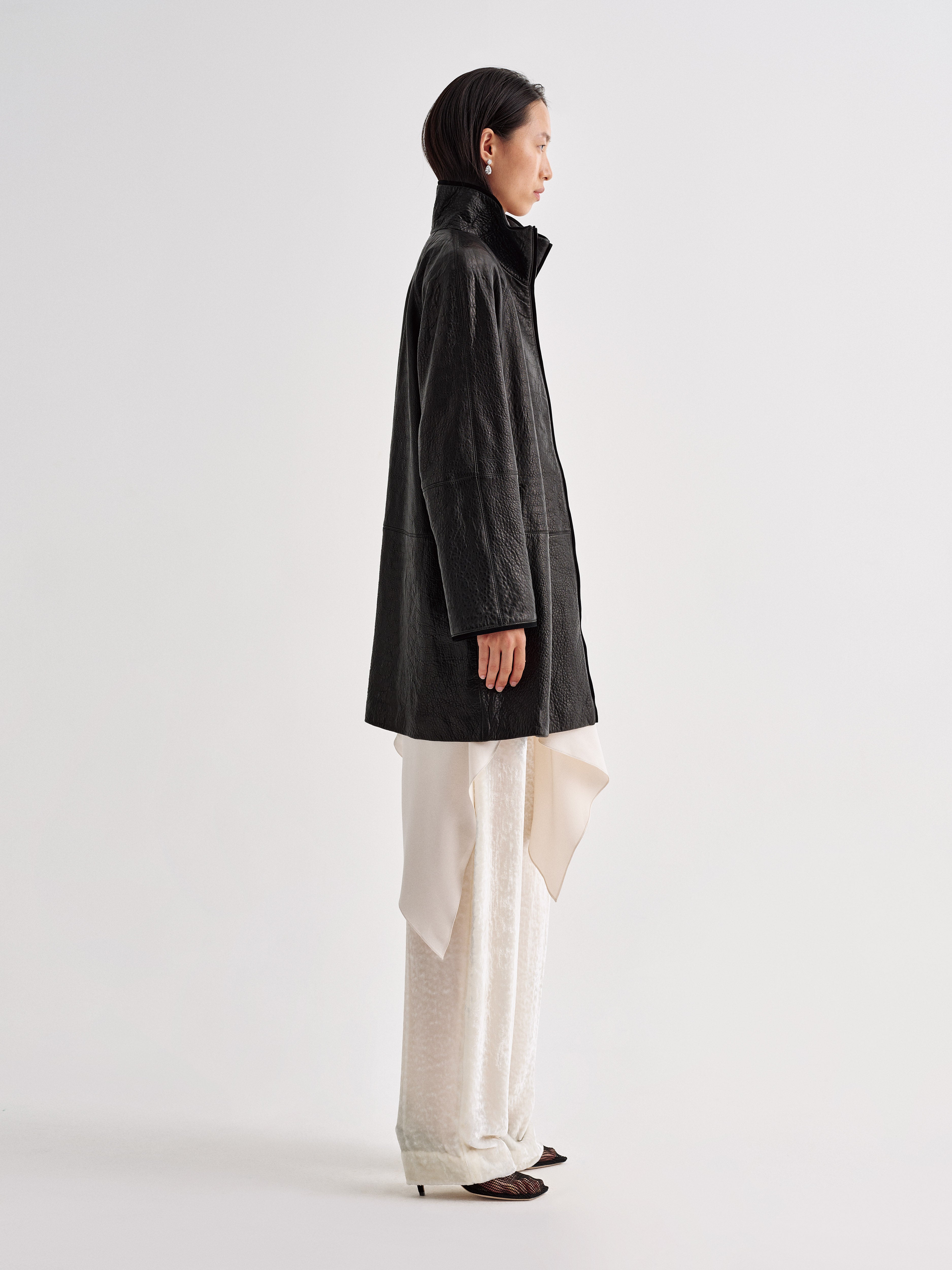 AFLALO Vanta Jacket in Black, side view on model