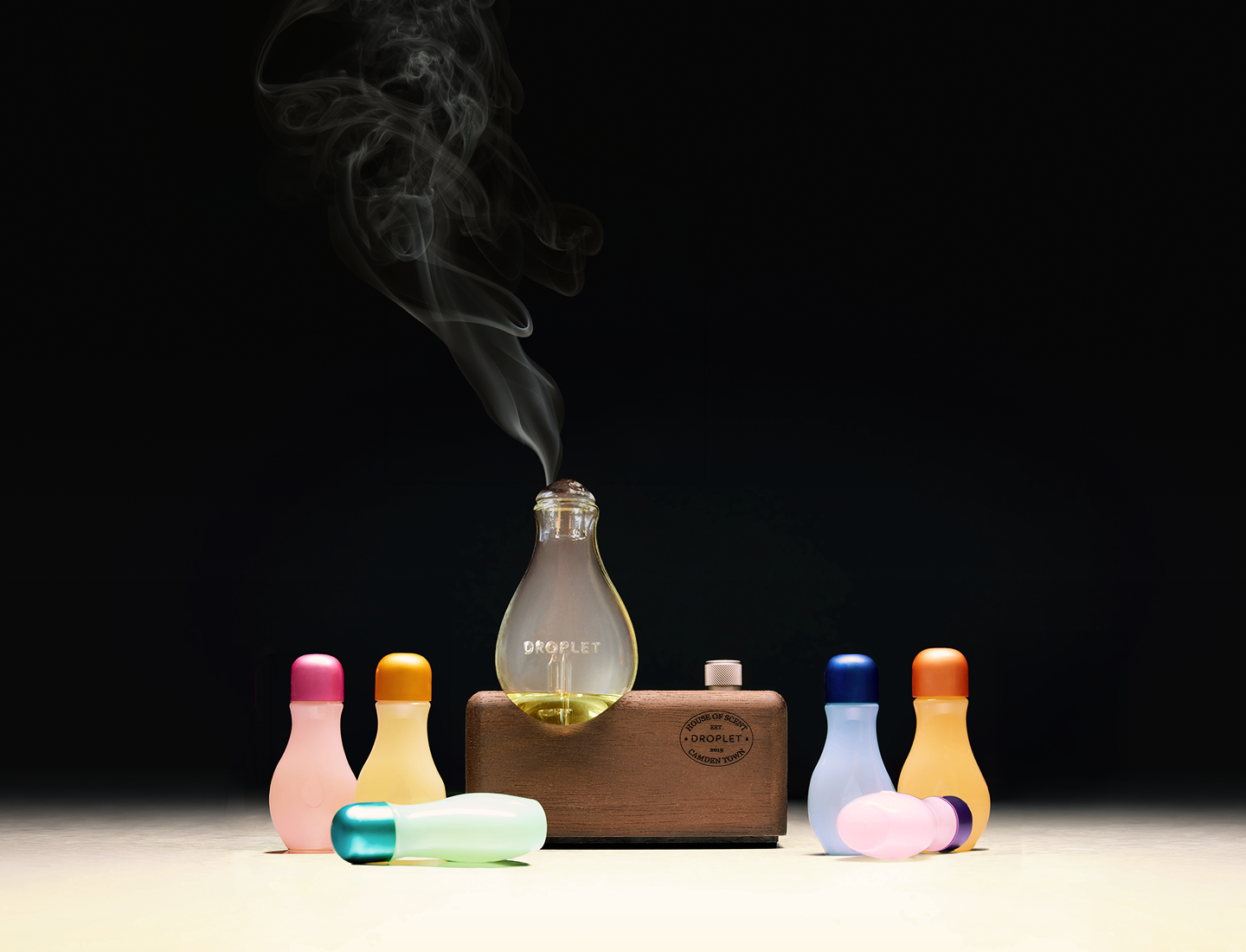 The Droplet Scent Amplifier glowing in a dark room