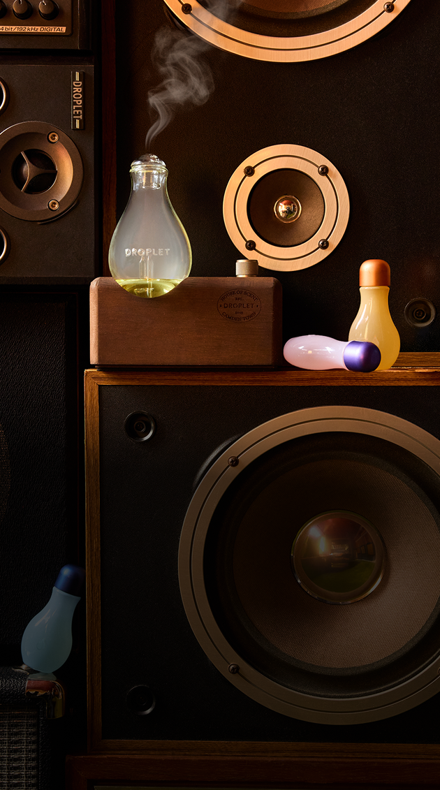 Droplet Scent Amplifier on a stack of vintage speakers