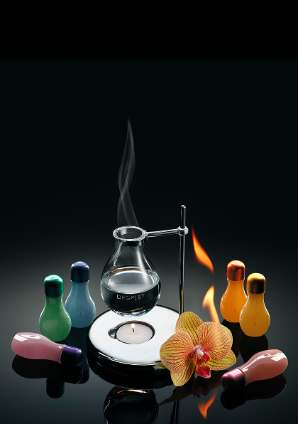 The Droplet Scent Burner with a lit tealight