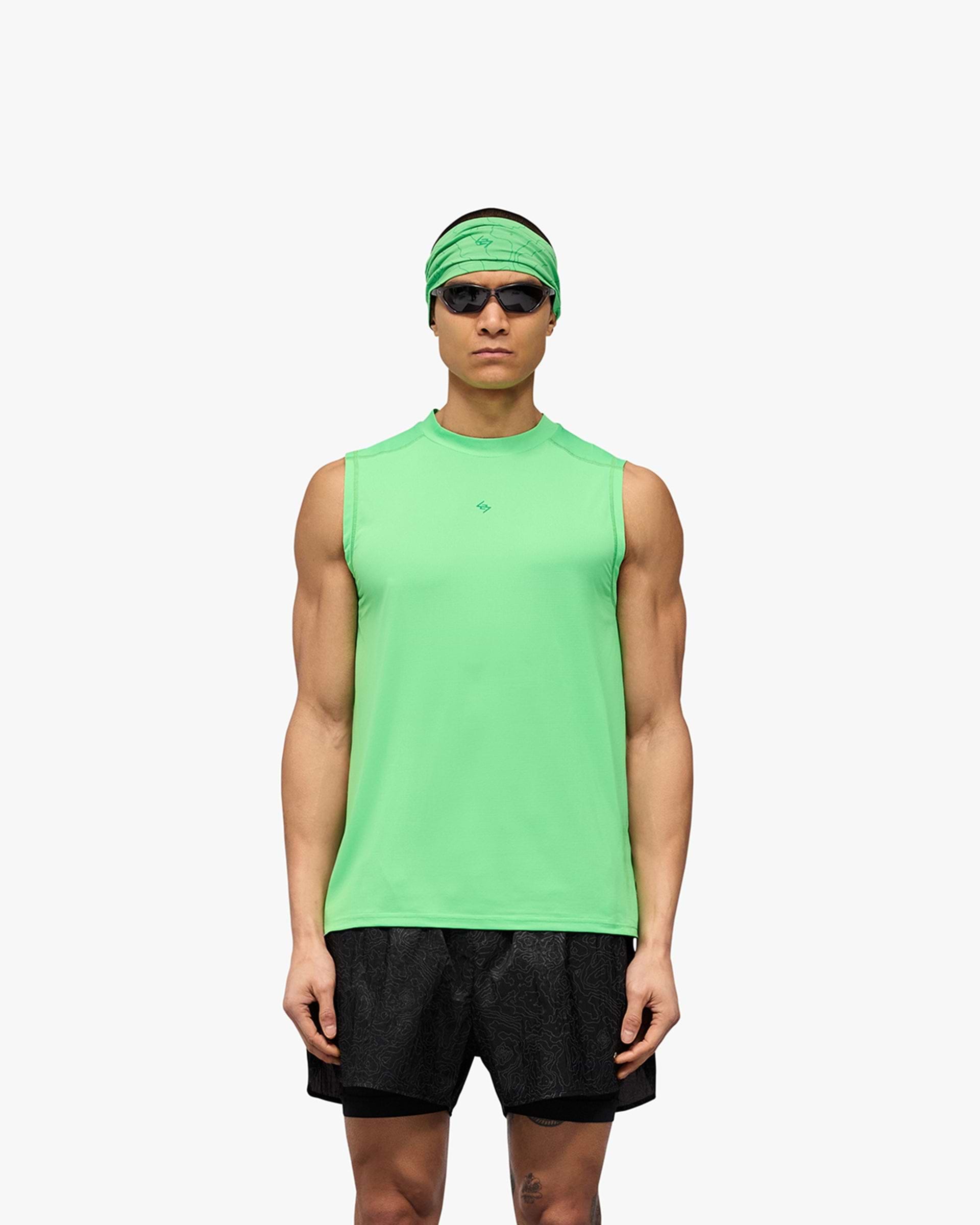 Man wearing a green running tank on a plain white background | 247 Contour Run Tank in Speed Green | Breathable and sweat-wicking running tank | 247 T-Shirts | Represent Clo