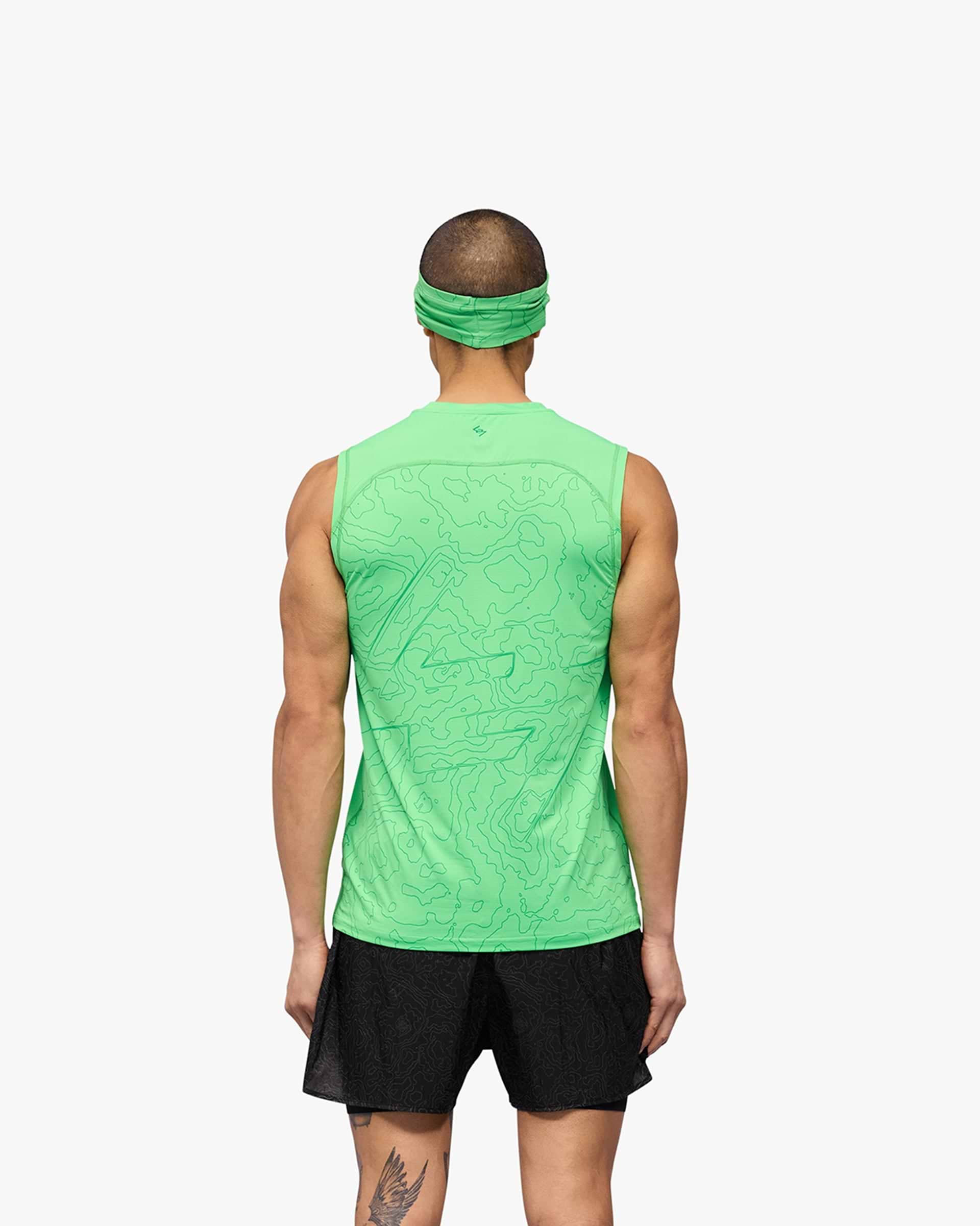 Man wearing a green running tank on a plain white background | 247 Contour Run Tank in Speed Green | Breathable mesh running tank with contour print and antibacterial finish | 247 T-Shirts | Represent Clo