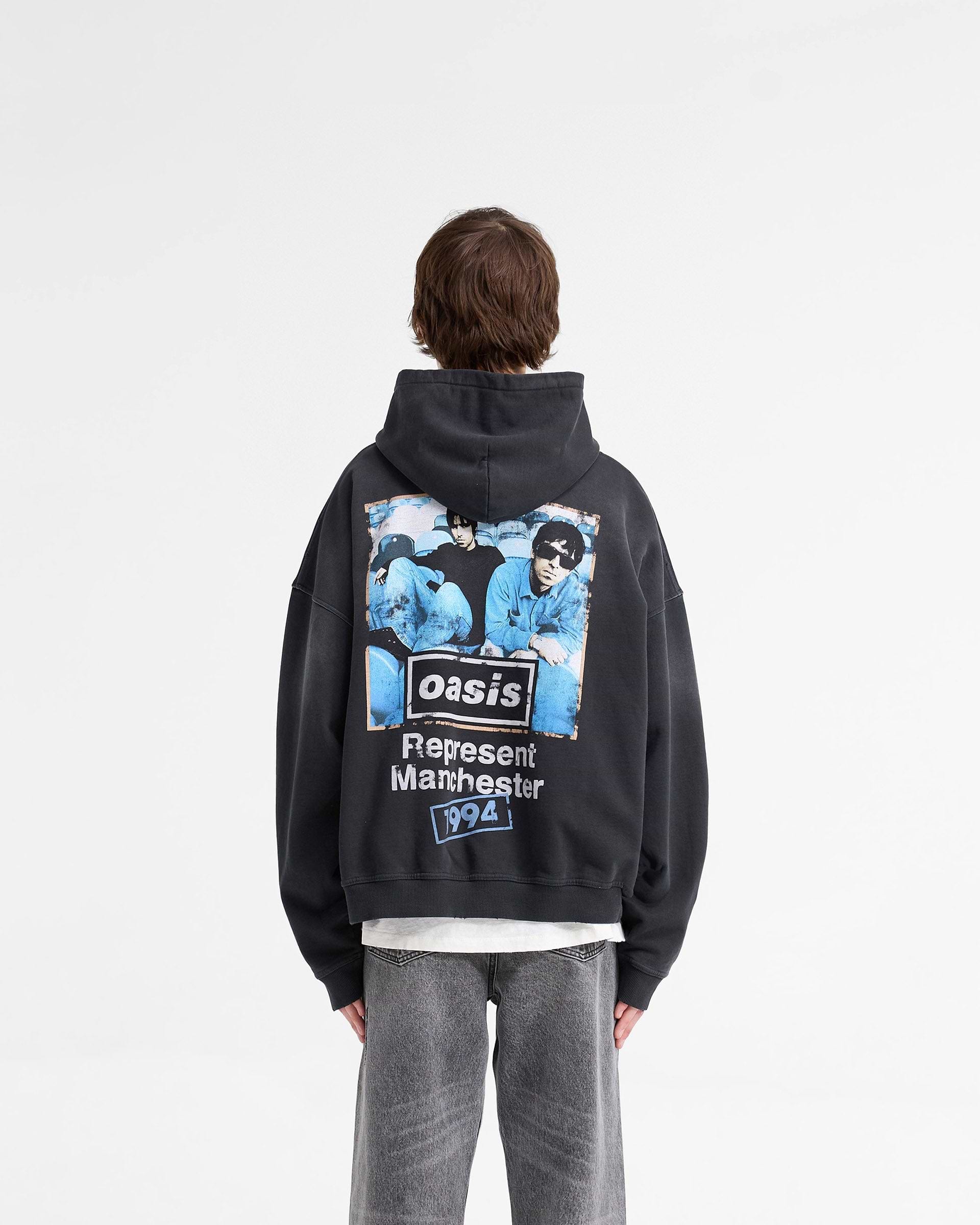Represent X Oasis Maine Road Hoodie - Negro Lavado