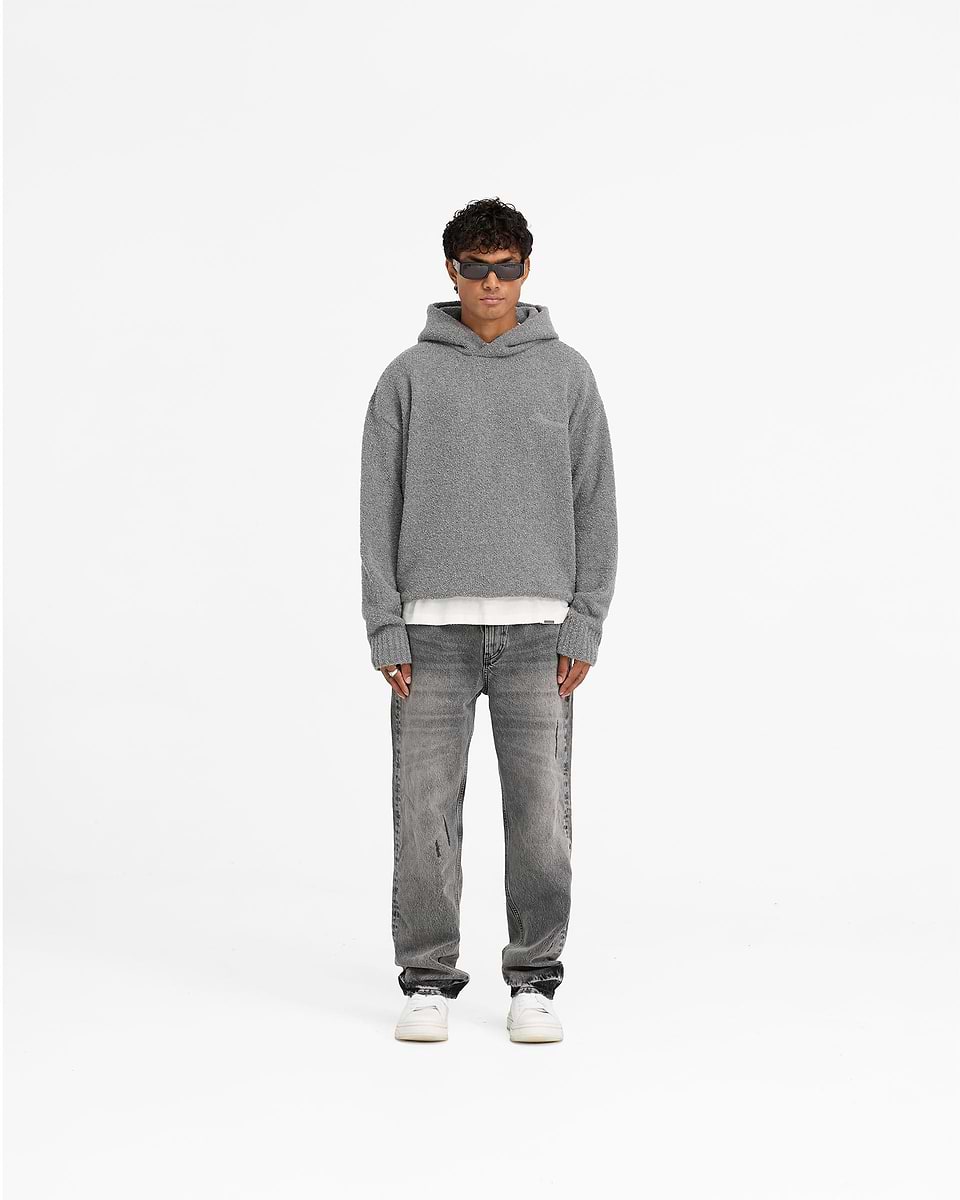 Man wearing an oversized grey boucle hoodie on a plain white background | Heavy Boucle Hoodie in Rock | Double lined oversized boxy hoodie | FW24 Knitwear | Represent Clo