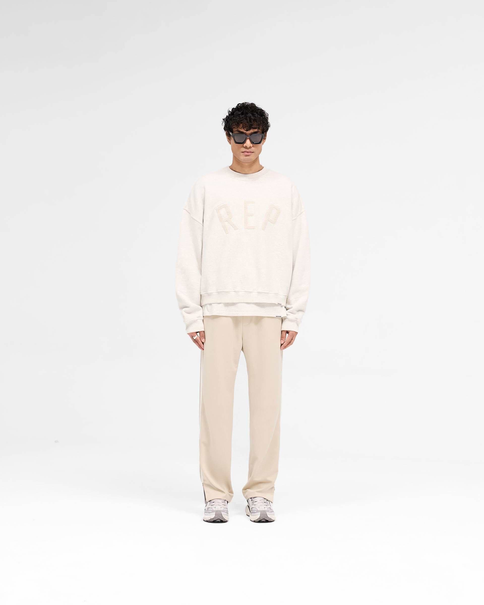 Rep Applique Sweater - Cream Marl