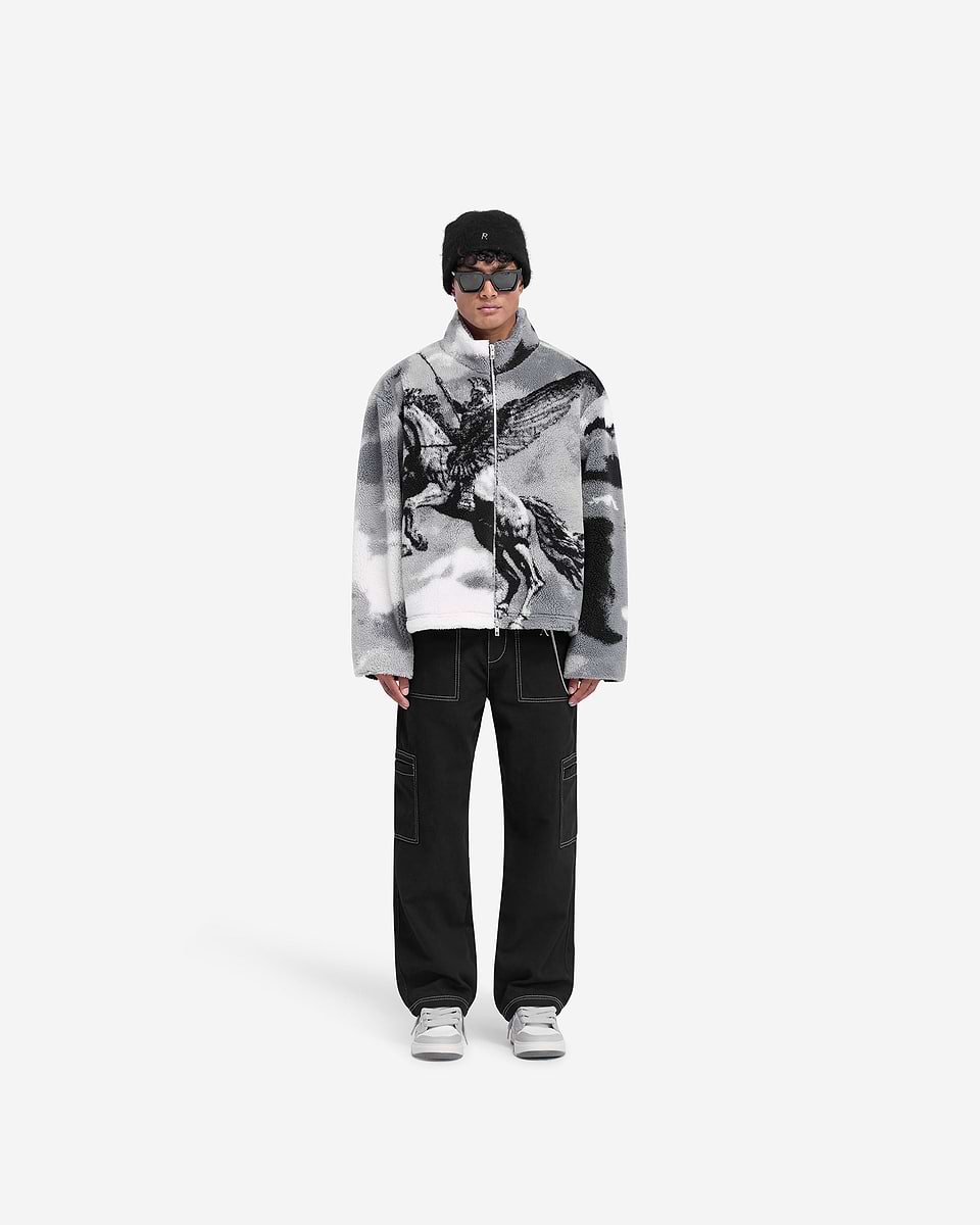 Man wearing a multi-coloured fleece on a plain white background | Mascot Fleece in Multi | Very oversized fleece with mascot print | FW24 Outerwear | Represent Clo