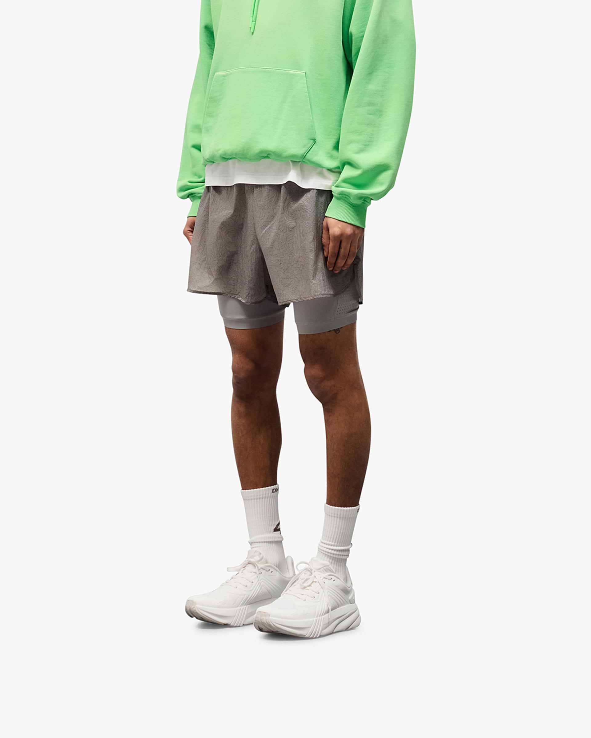 Back product image of mens grey shorts on a plain white background | 247 Contour 2-In-1 Run Shorts in Titanium | Shorts with inner legging and zip pockets | 247 Shorts | Represent Clo