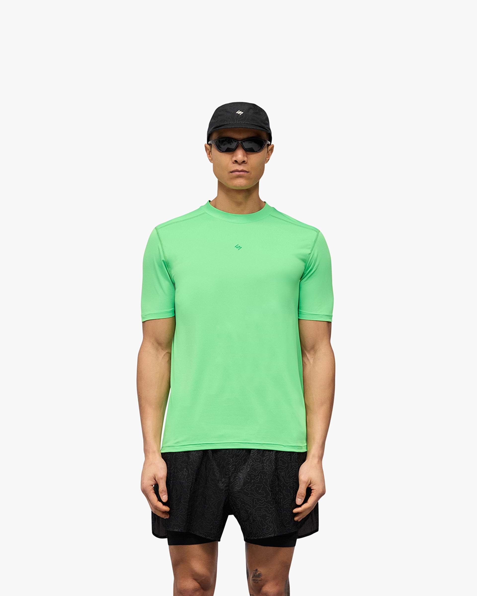 Man wearing a green t-shirt on a plain white background | 247 Contour Run T-Shirt in Speed Green | Breathable and sweat-wicking running t-shirt | 247 T-Shirts | Represent Clo