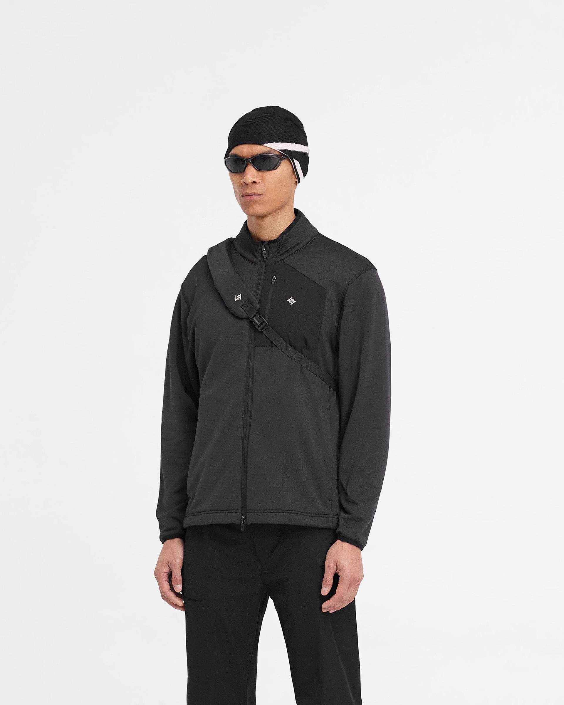 Back product image of a mens black fleece jacket on a plain white background | 247 Full Zip Fleece in Black | Fleece jacket with adjustable hem and zip pockets | 247 Outerwear | Represent Clo