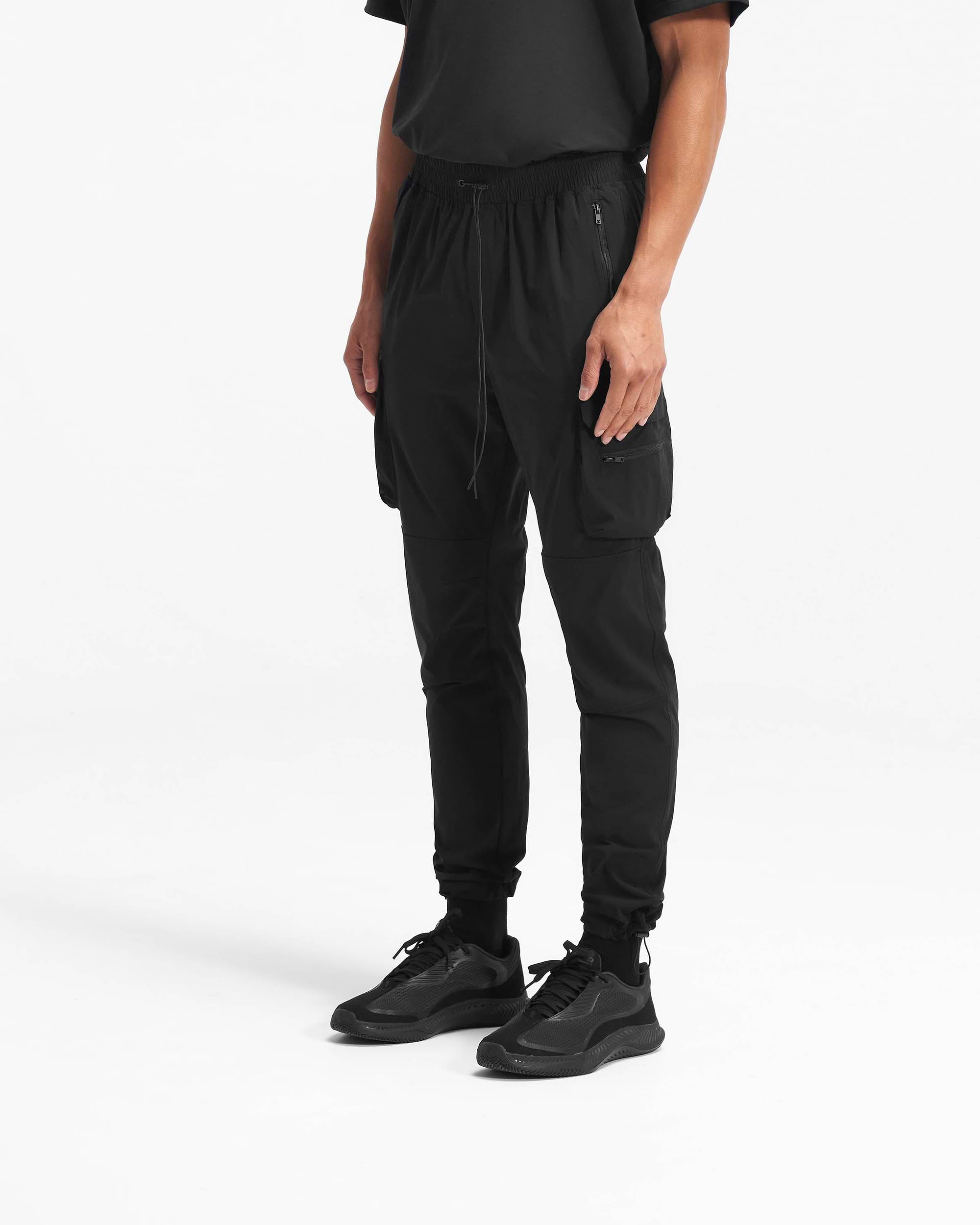 Back product image of mens black pants on a plain white background | 247 Pant in Black | Cargo pants with dual cargo pockets and adjustable details | 247 Pants | Represent Clo