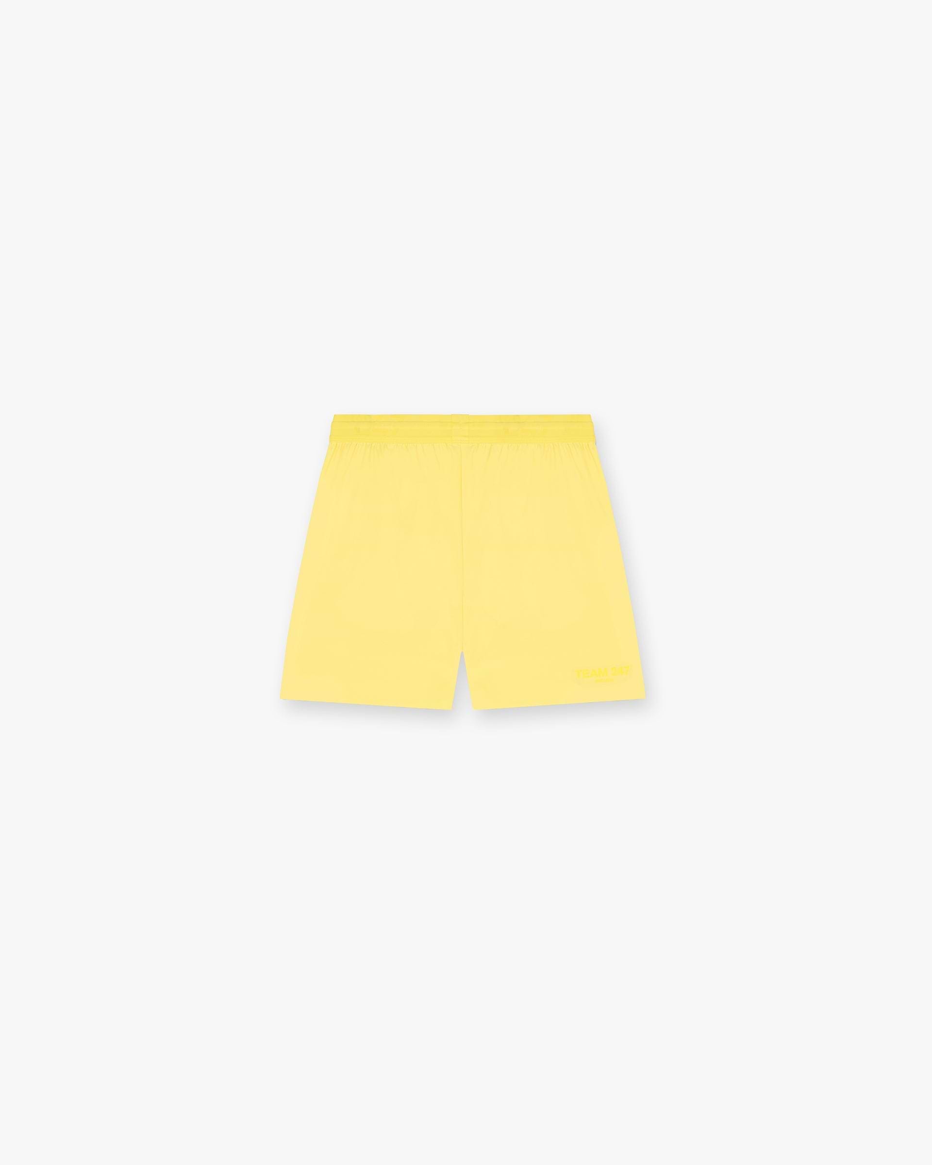Front product image of mens yellow shorts on a plain white background | Team 247 Fused Shorts in Lemon | Athletic shorts with fused seams | 247 Shorts | Represent Clo