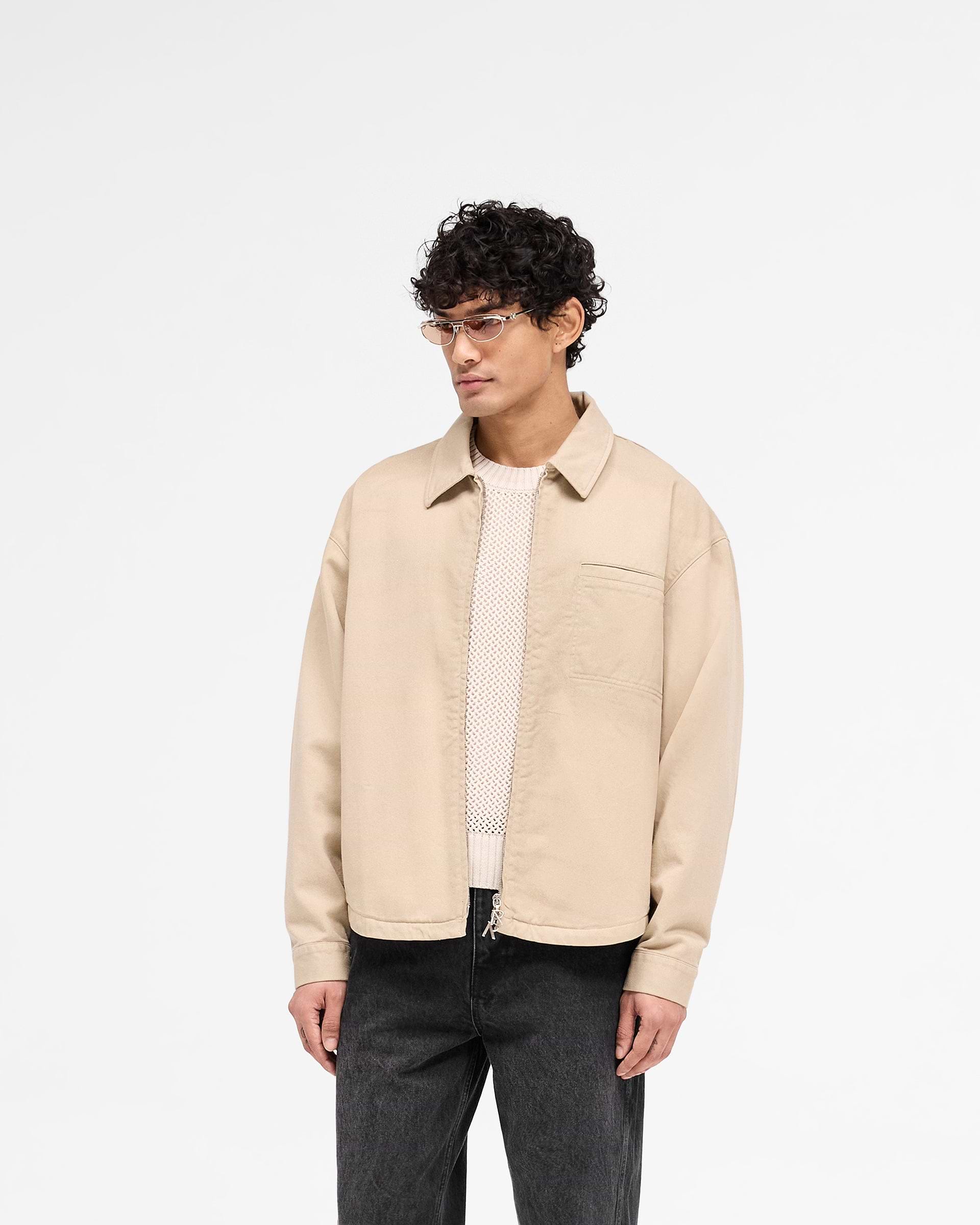 Back product image of a mens beige cotton shirt on a plain white background | Cotton Zip Through Shirt in Beige | Shirt with double zips and chest pocket | SS25 Shirts | Represent Clo