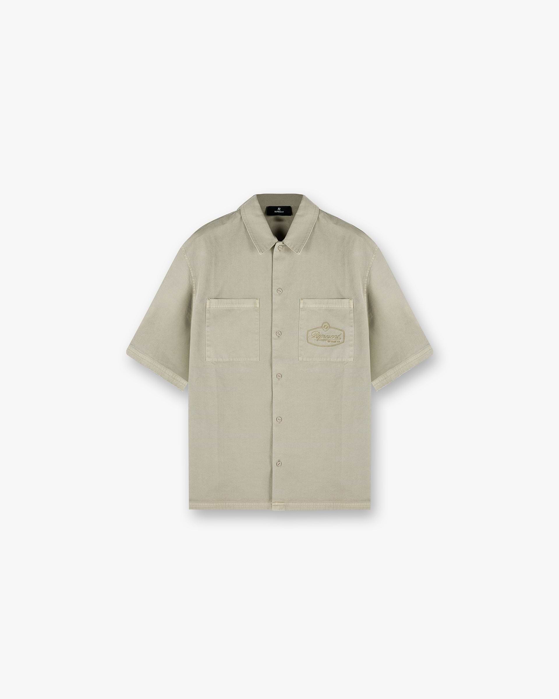 Front product image of a mens beige shirt on a plain white background | Short Sleeve Cotton Overshirt in Beige | Jersey cotton shirt | SS25 Shirts | Represent Clo