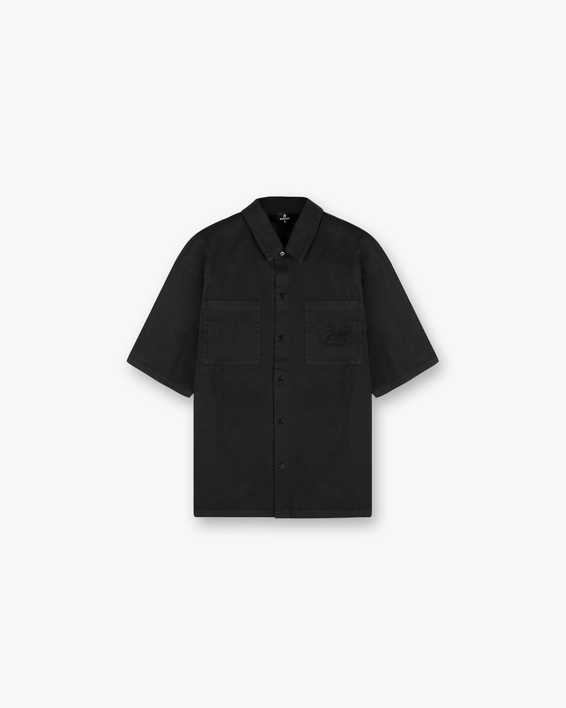 Front product image of a mens black shirt on a plain white background | Short Sleeve Cotton Overshirt in Washed Black | Short sleeve cotton shirt | SS25 Shirts | Represent Clo
