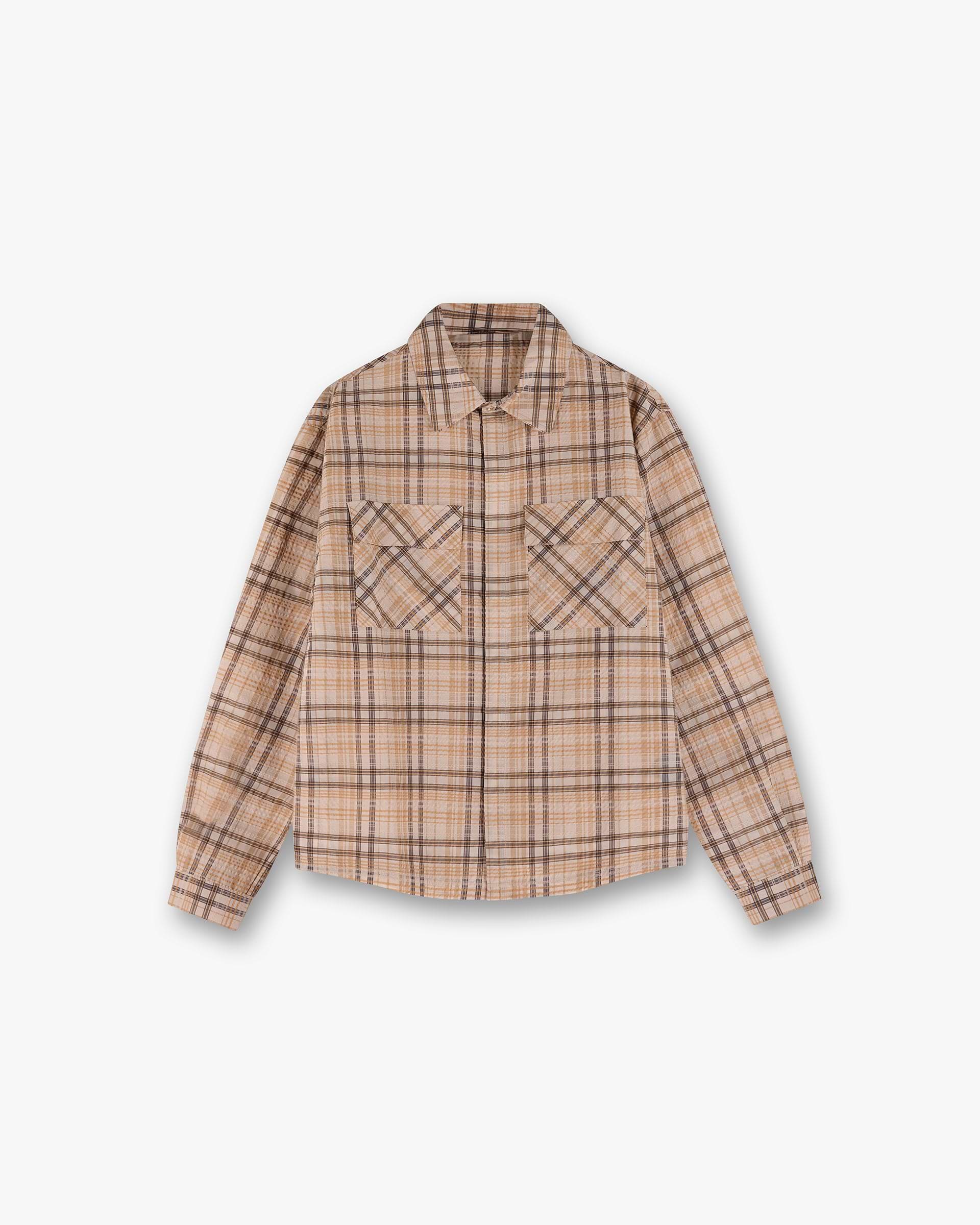 Front product image of a mens brown check shirt on a plain white background | Sheer Flannel Shirt in Brown Check | Lightweight flannel shirt with a relaxed check pattern | SS25 Shirts | Represent Clo