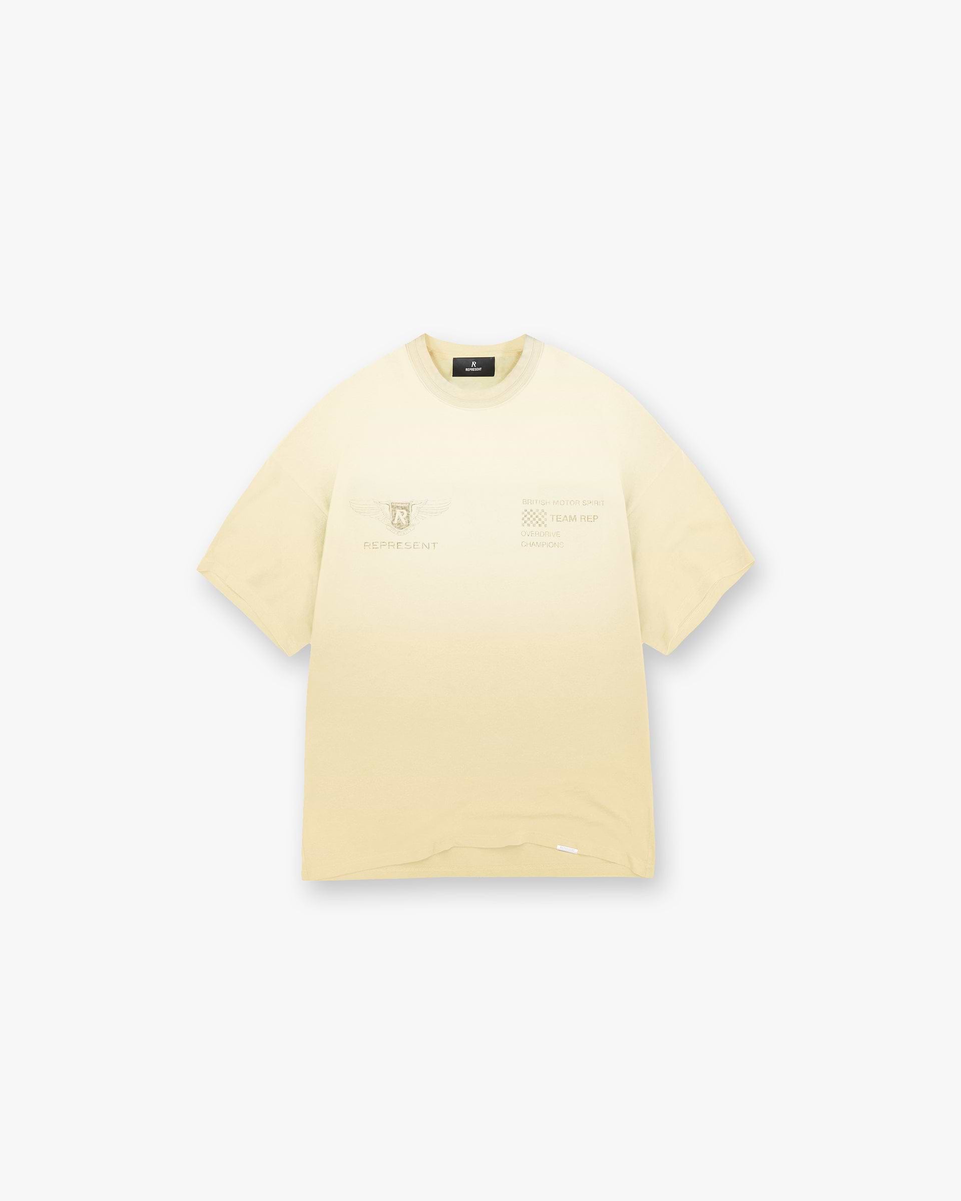 Front product image of a mens light yellow t-shirt on a plain white background | Team Rep T-Shirt in Light Yellow | Soft t-shirt with logo branding | SS25 T-Shirts | Represent Clo