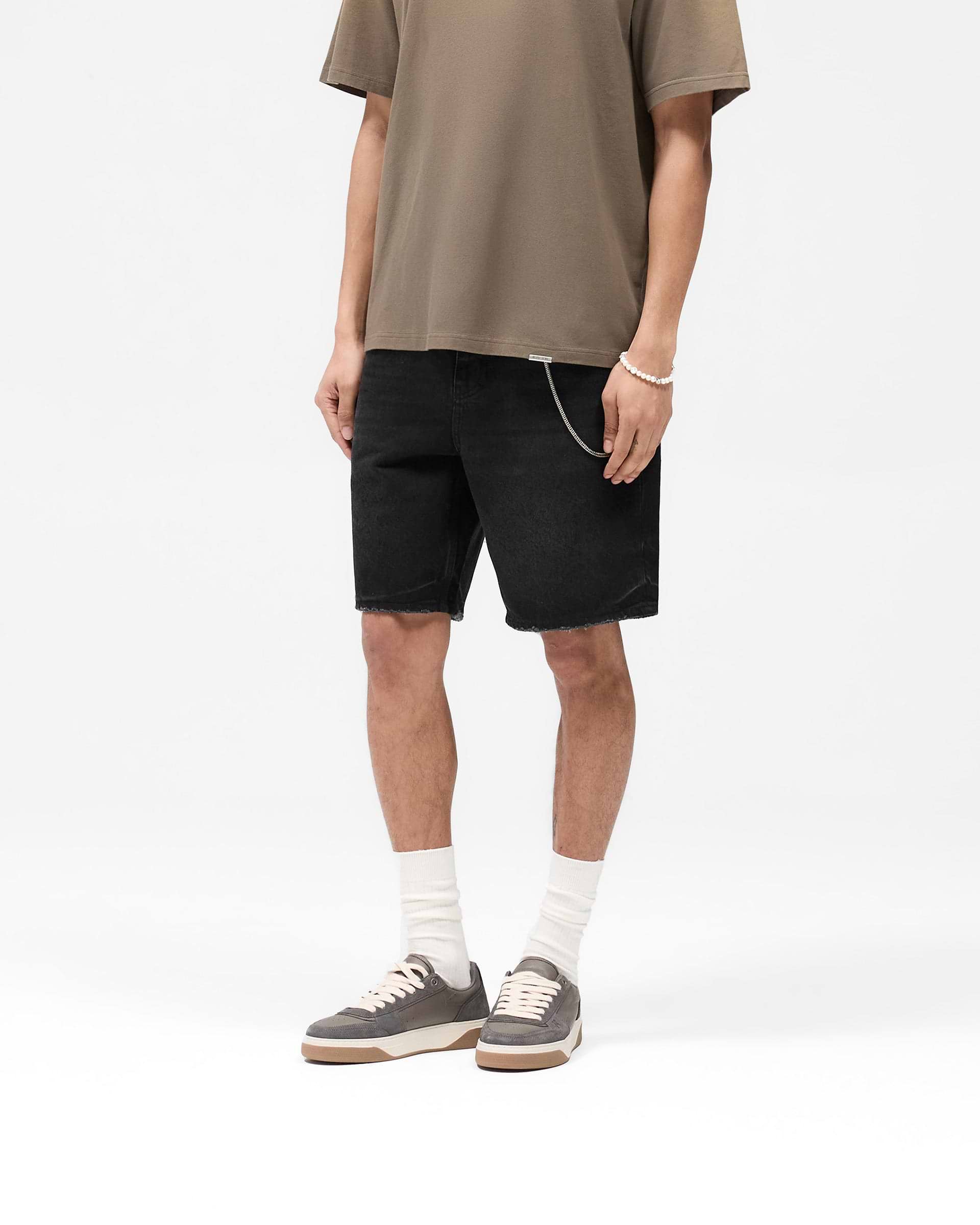 Back product image of mens black denim shorts on a plain white background | R10T Tailored Denim Shorts in Black | Tailored shorts with vintage-inspired faded wash | SS25 Denim | Represent Clo