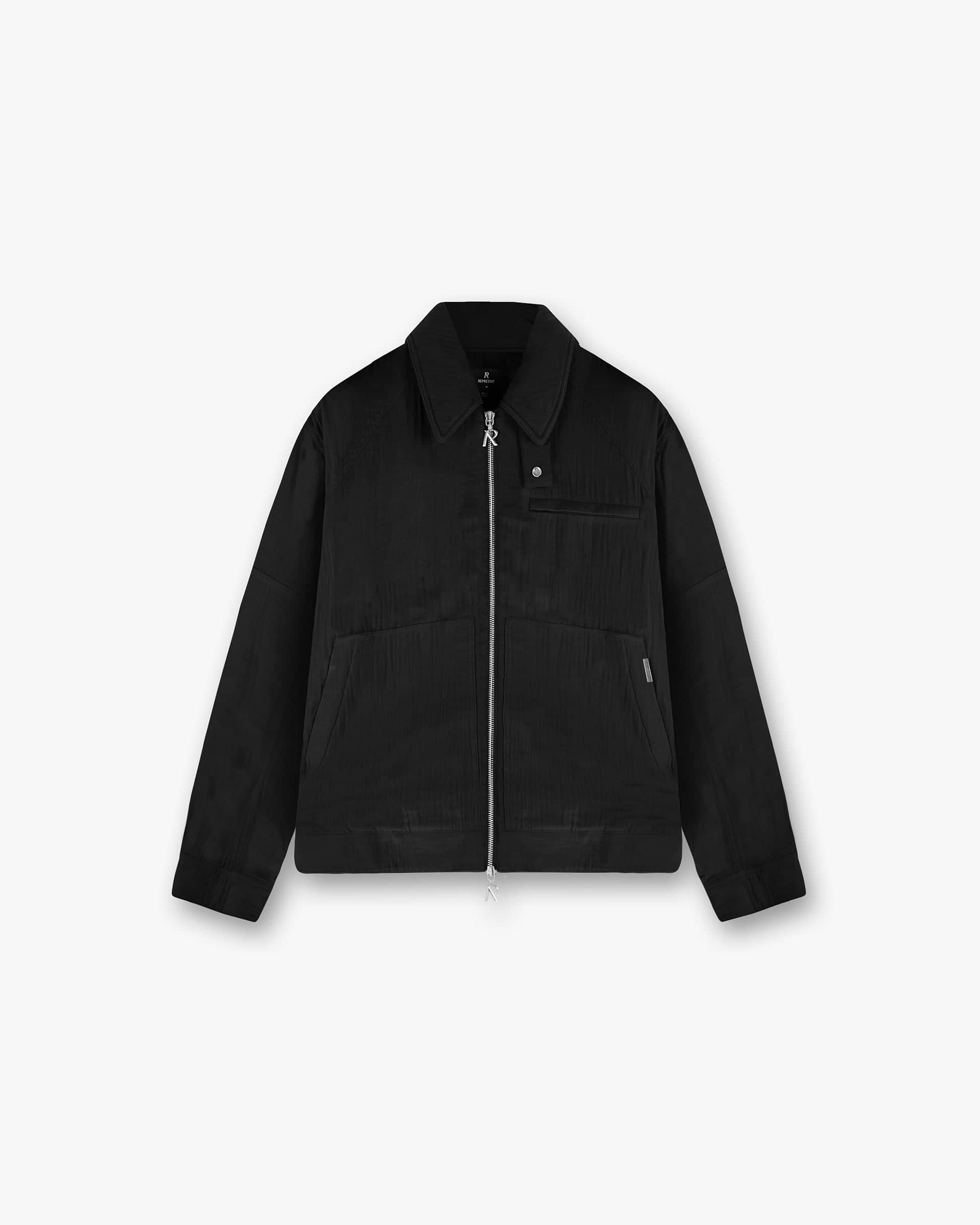 Front product image of a mens black cotton jacket on a plain white background | Crinkle Trucker Jacket in Black | Textured cotton jacket with oversized shirt collar and adjustable cuffs | SS25 Outerwear | Represent Clo