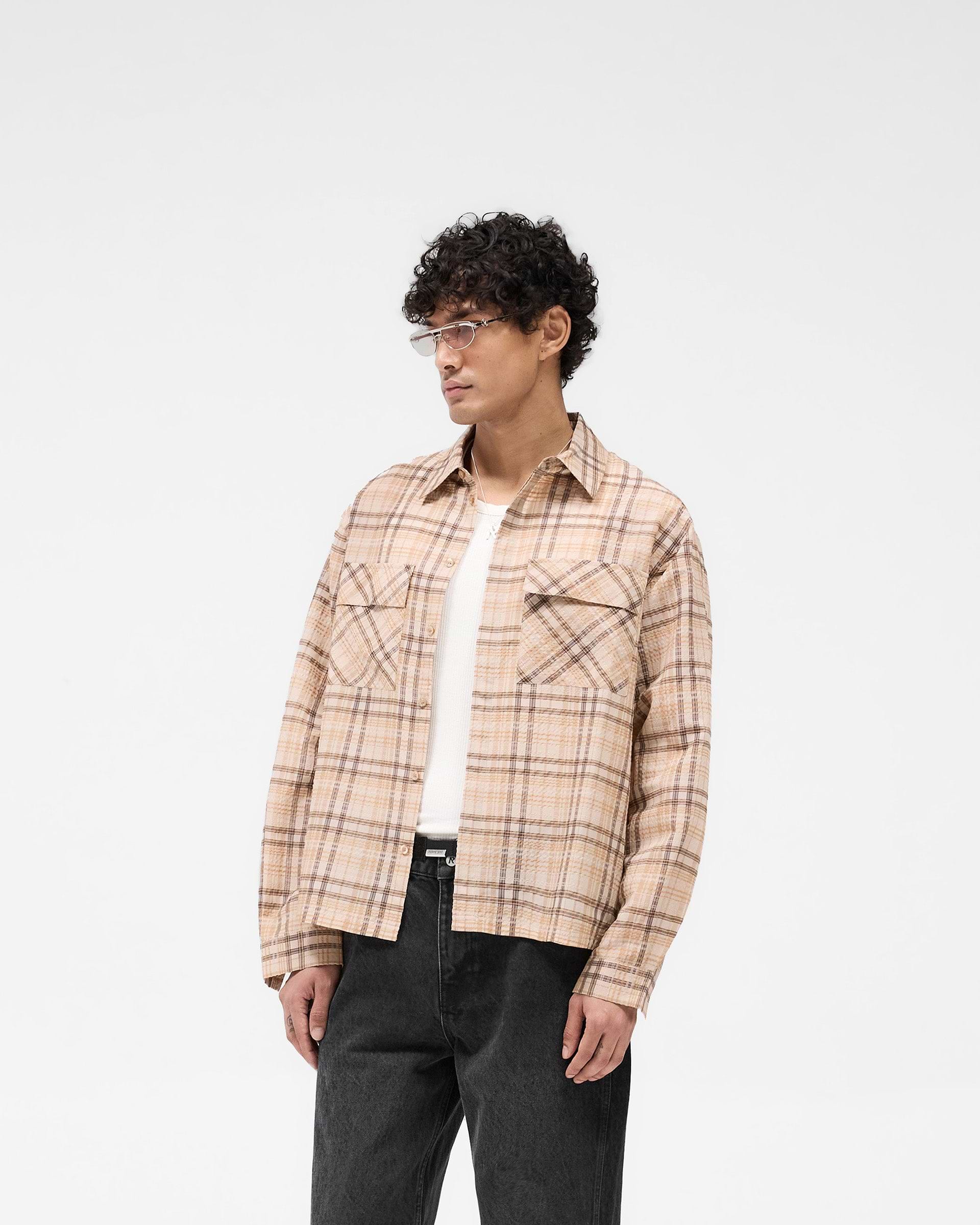 Back product image of a mens brown check shirt on a plain white background | Sheer Flannel Shirt in Brown Check | Lightweight sheer flannel shirt with dual chest pockets | SS25 Shirts | Represent Clo