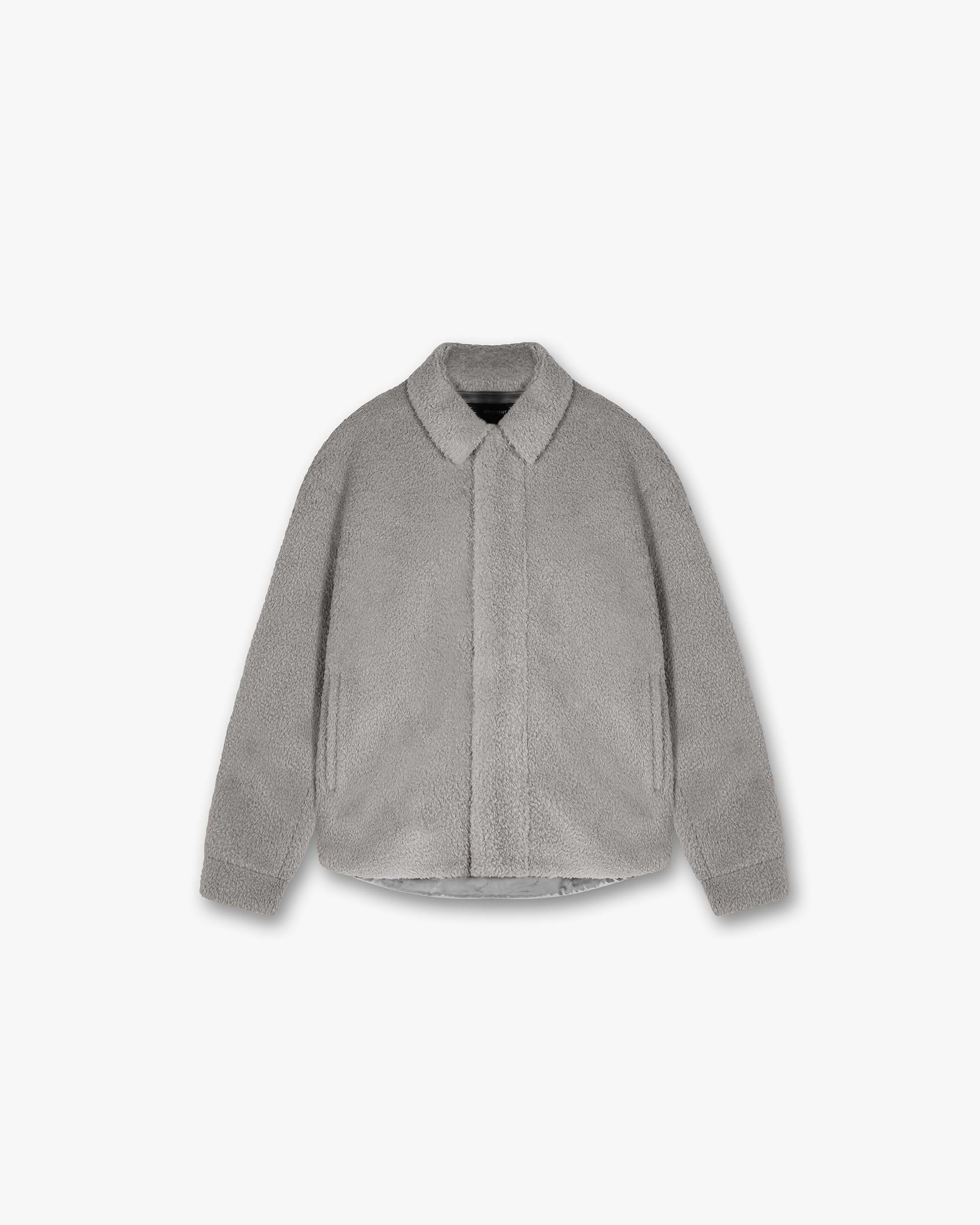 Front product image of a mens grey shirt on a plain white background | Shearling Scoop Hem Shirt in Ice Grey | Shearling shirt with scoop hem design | PRE SS24 Shirts | Represent Clo