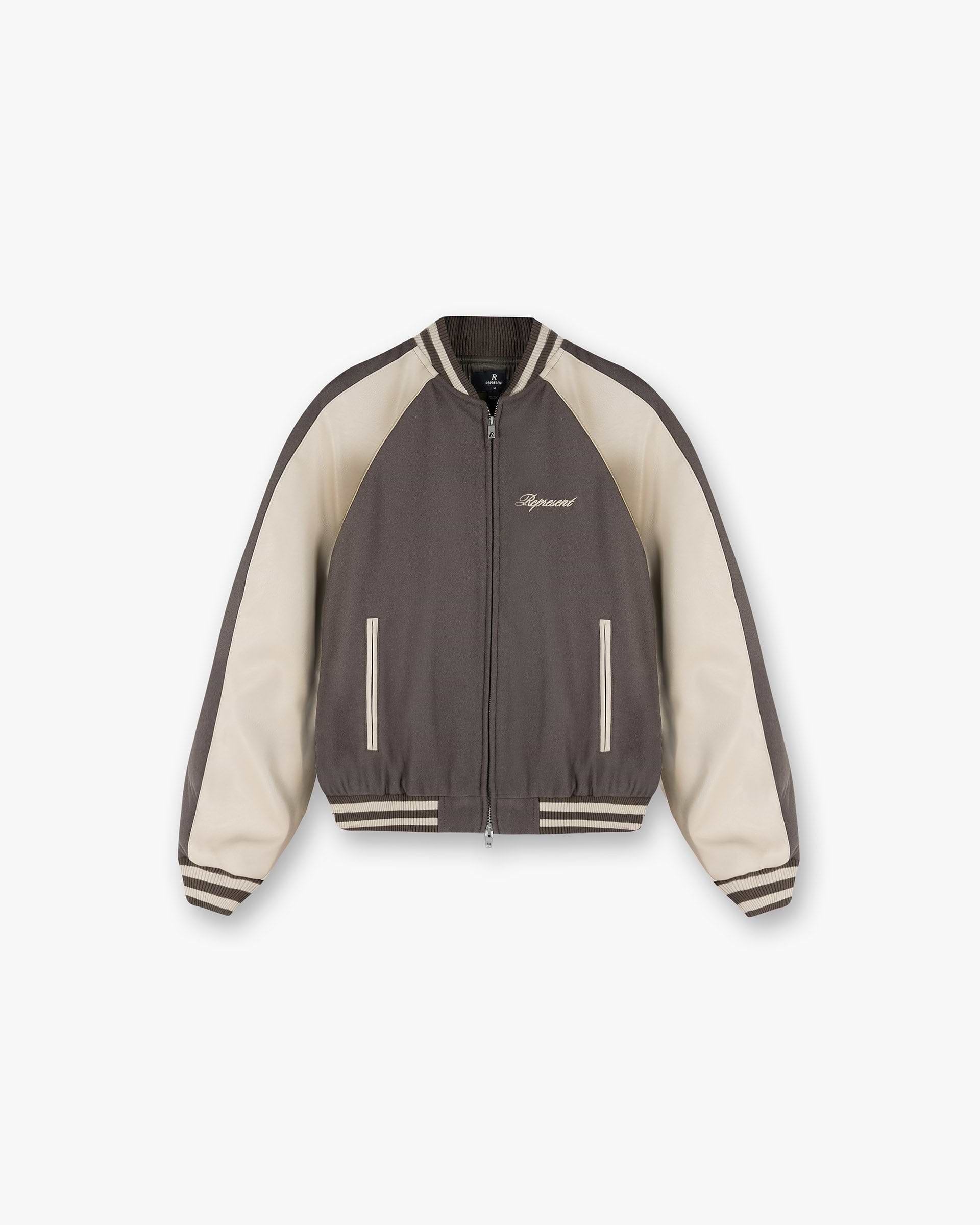 Front product image of a mens stone jacket on a plain white background | Raglan Varsity Jacket in Stone | Varsity style outerwear with raglan sleeves | SS25 Outerwear | Represent Clo