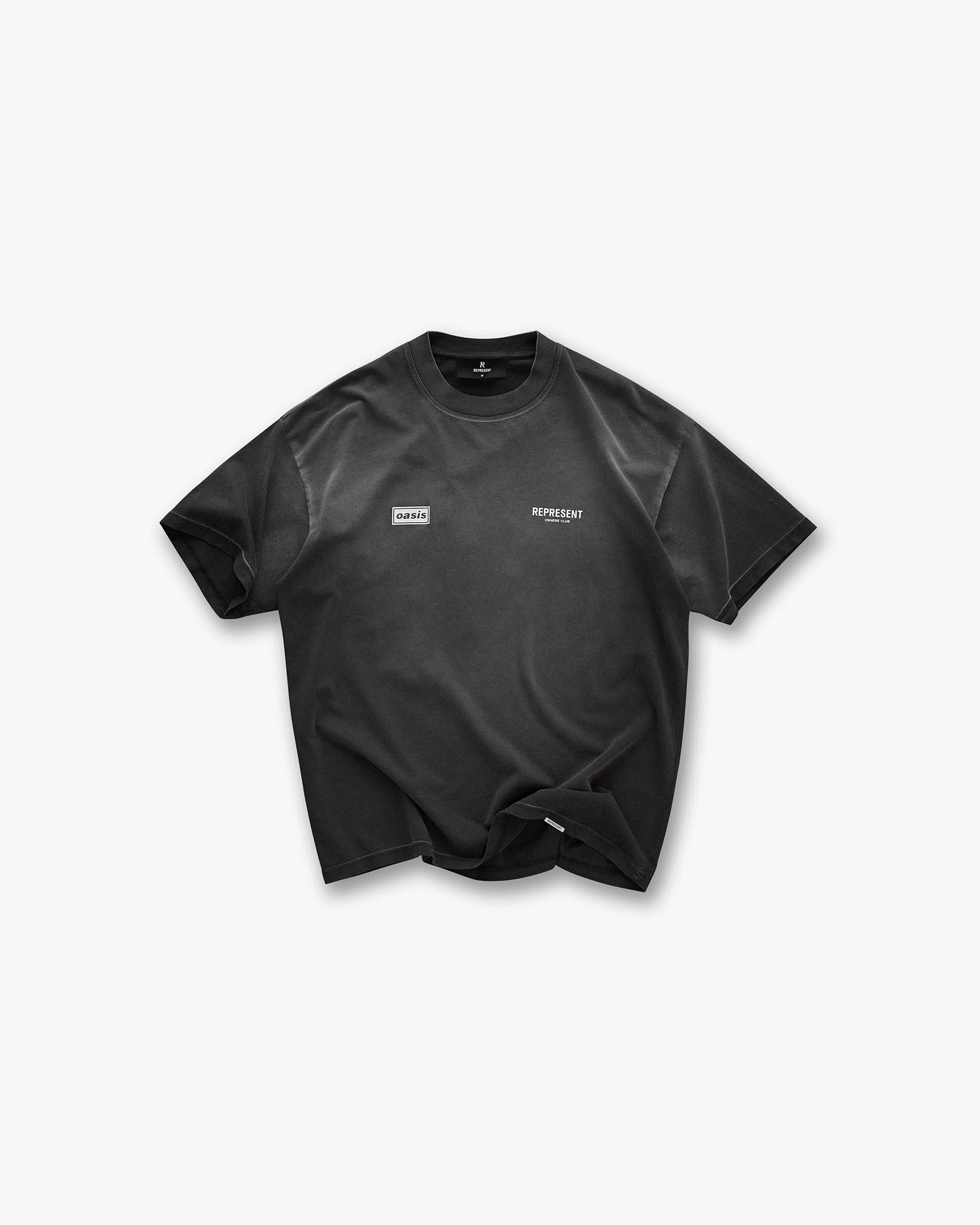 Front product image of a mens black t-shirt on a plain white background | Represent X Oasis Owners Club T-Shirt in Stained Black | Graphic t-shirt with logo branding | FW24 T-Shirts | Represent Clo