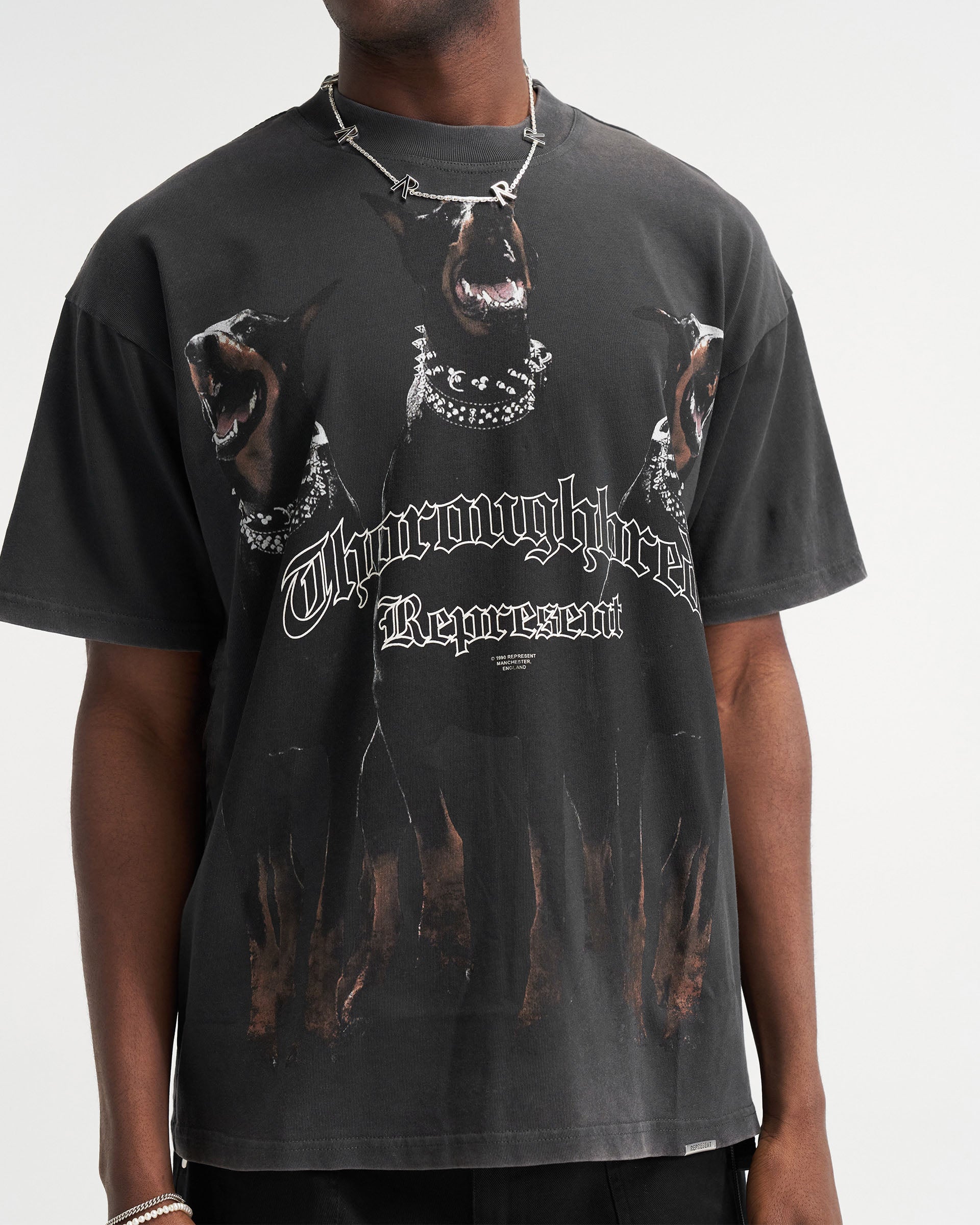 Back product image of a mens black t-shirt on a plain white background | Thoroughbred T-Shirt in Vintage Black | Short sleeve jersey t-shirt with Thoroughbred graphic | FW21 T-Shirts | Represent Clo