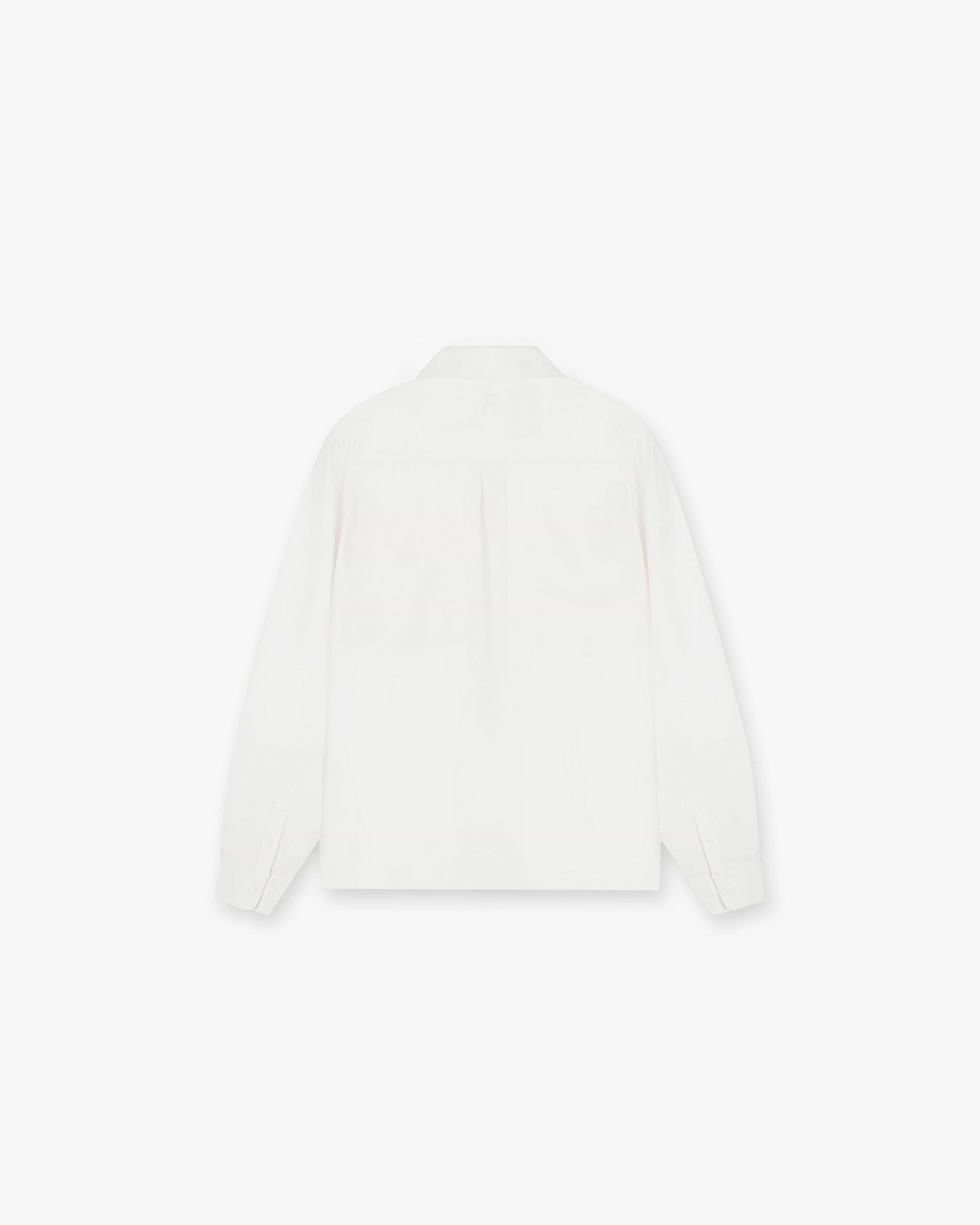 Back product image of a mens white shirt on a plain white background | Initial Shirt in Flat White | Drapey fabric with chest pockets and concealed placket | Initial Shirts | Represent Clo