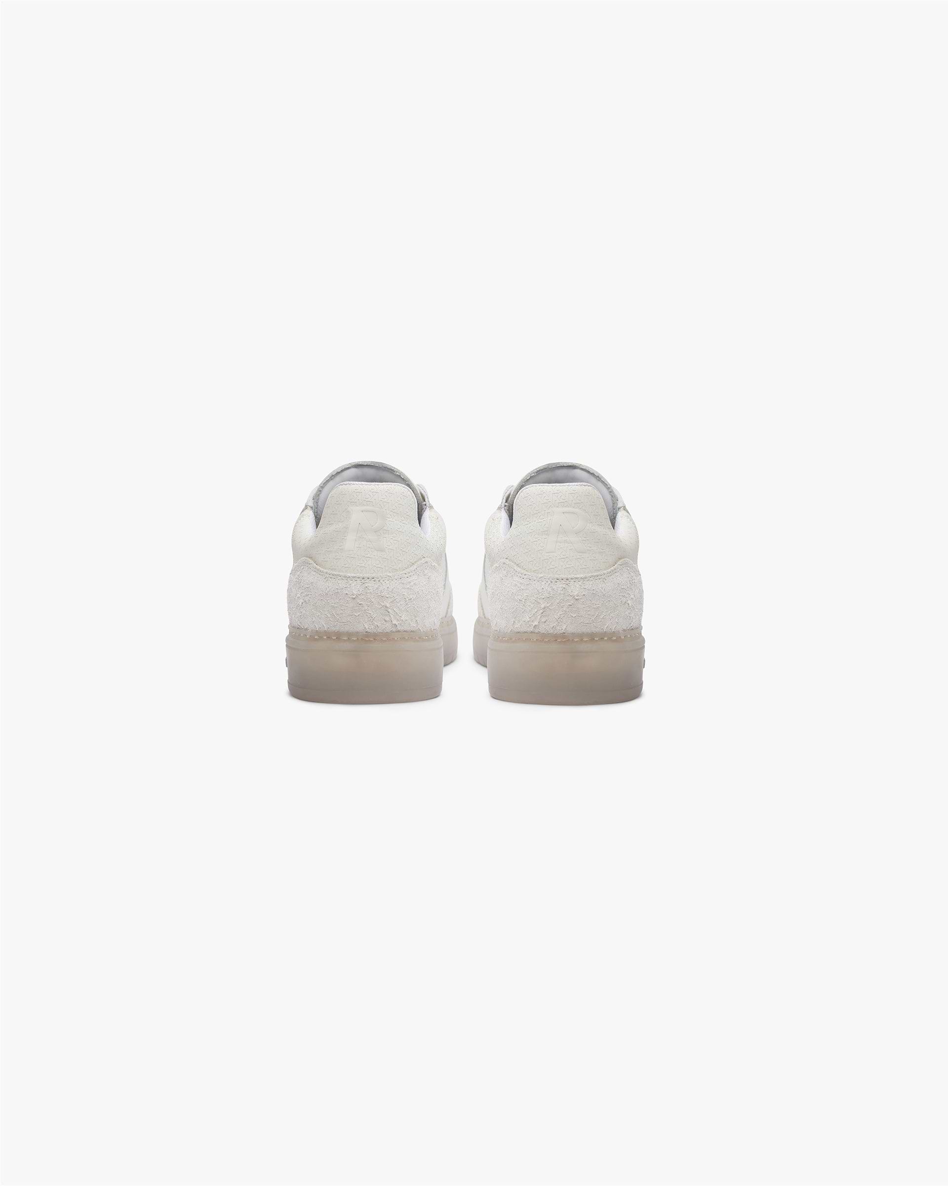 Product image of a mens white sneaker on a plain white background | Virtus in Vintage White | Low profile sneaker with tri-leather upper | FW23 Footwear | Represent Clo