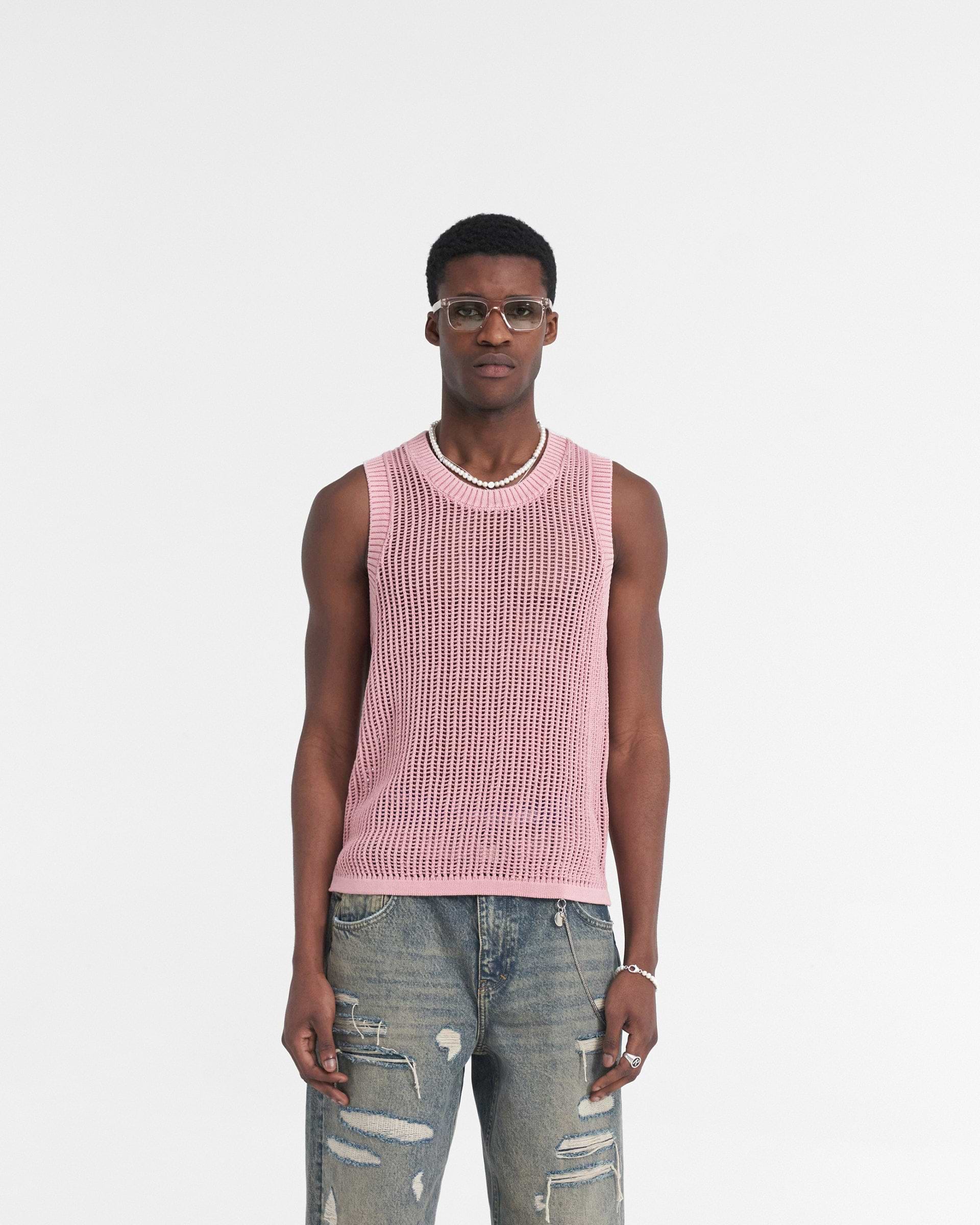 Man wearing a sunrise knit vest on a plain white background | Washed Knit Vest in Sunrise | Light summer knit regular fit vest | SS24 Knitwear | Represent Clo