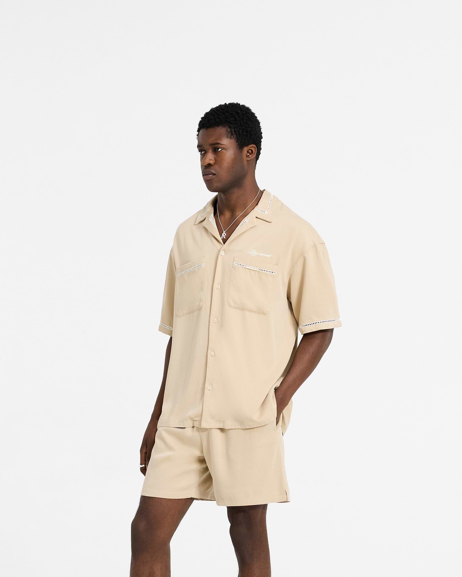 Back product image of a mens brown shirt on a plain white background | Resort Shirt in Latte | Drapey shirt with revere collar and chest pockets | SC24 Shirts | Represent Clo