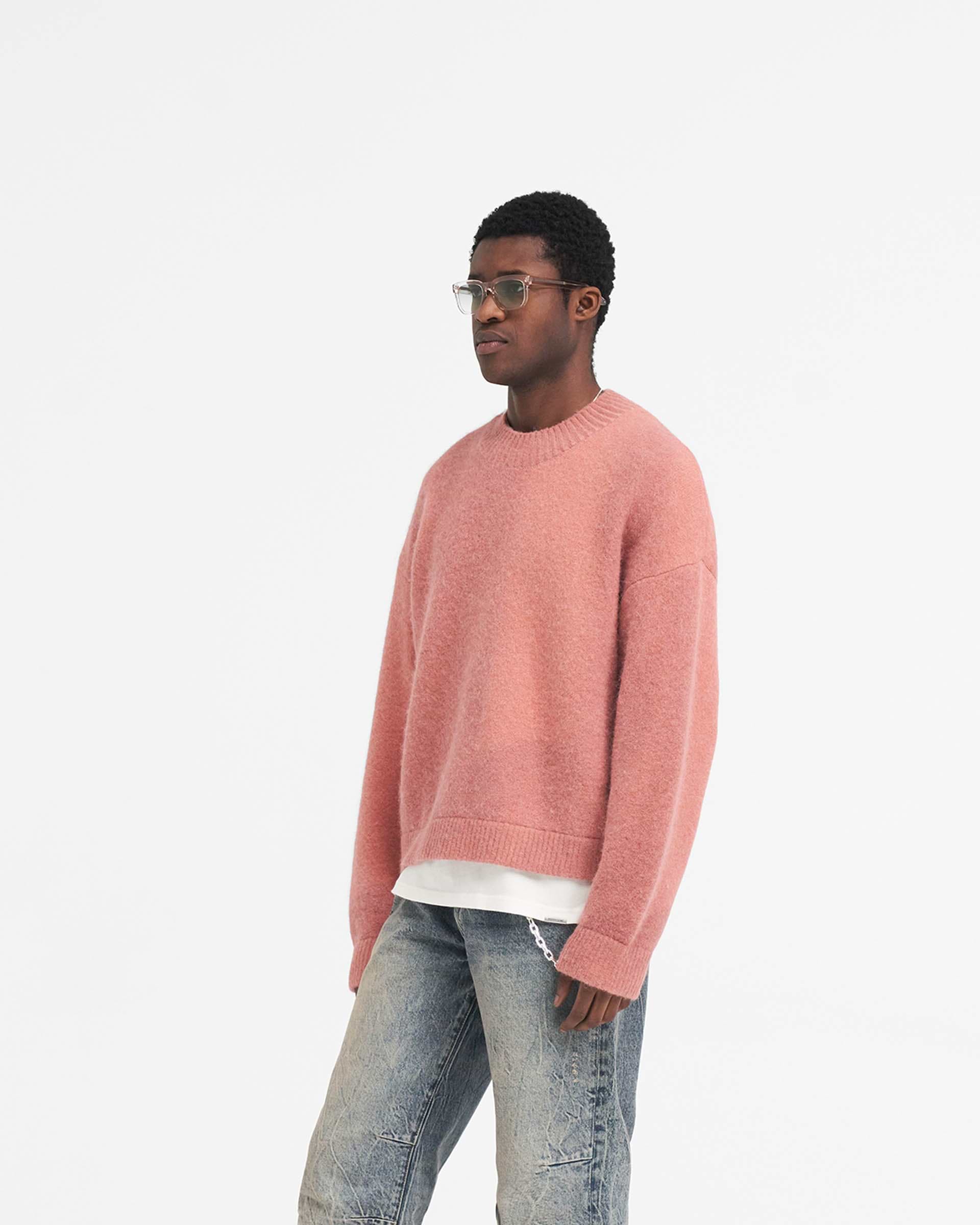 Back product image of a mens sweater in sunrise on a plain white background | Sprayed Horizons Sweater in Sunrise | Boxy oversized knitwear with ribbed hem and abstract spray | SS24 Knitwear | Represent Clo
