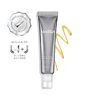Medik8 Crystal Retinal Ceramide Eye 6 cream tube alongside a zigzag swatch of yellow cream against a white background. Two silver badges highlight "WINNER OF 4+ GLOBAL AWARDS" and "WORLD FIRST PATENTED TECHNOLOGY".