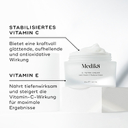 Medik8 C-Tetra Cream Tiegel geöffnet auf einem weißen Steinblock vor einem klaren weißen Hintergrund präsentiert. Das Bild zeigt zwei Hauptinhaltsstoffe und ihre Vorteile:

STABILISIERTES VITAMIN C: Sorgt für kraftvolle glättende, aufhellende und antioxidative Vorteile.

VITAMIN E: Nährt intensiv und verstärkt die Wirkung von Vitamin C für maximale Ergebnisse.