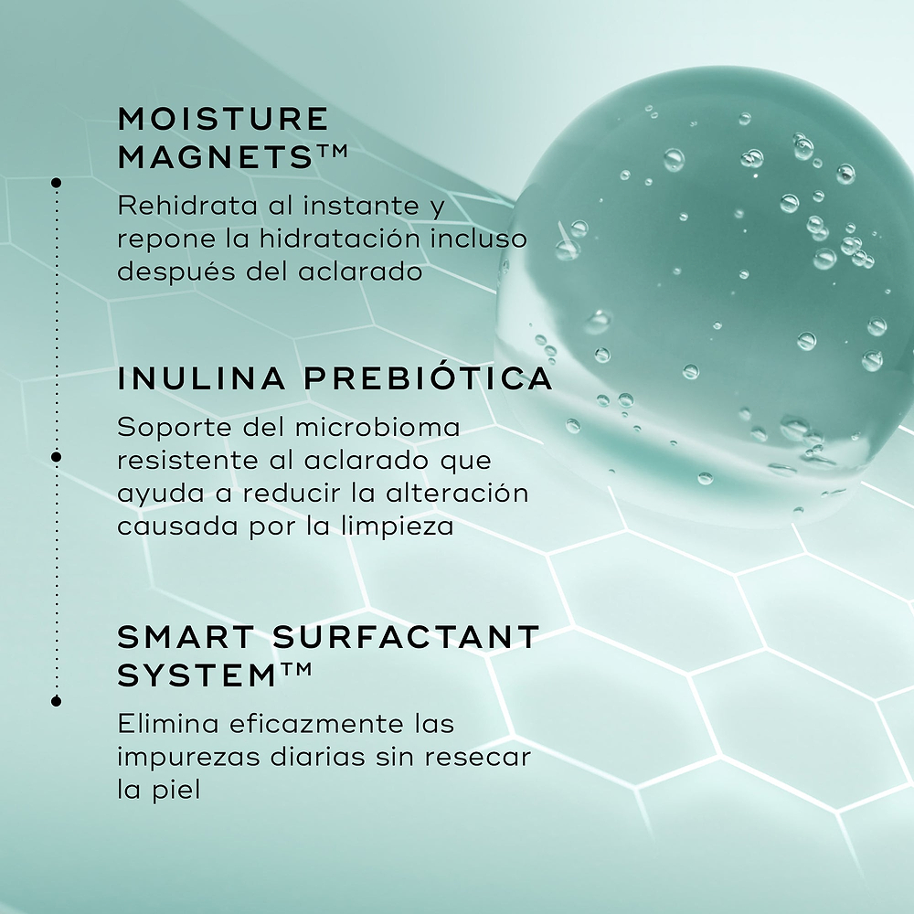  Imagen de los ingredientes: «IMANES DE HIDRATACIÓN», «INULINA PREBIÓTICA» y «SISTEMA DE TENSIOACTIVOS INTELIGENTES». El fondo es de un suave color verde menta con un patrón hexagonal y una gran gota translúcida de color verde azulado a la derecha.