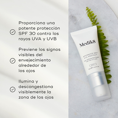 El tubo de Advanced Day Eye Protect yace sobre una superficie de mármol junto a una hoja verde de helecho. El texto destaca su protección SPF 30, la prevención de los signos visibles del envejecimiento y su capacidad para iluminar y desinflamar el contorno de ojos.