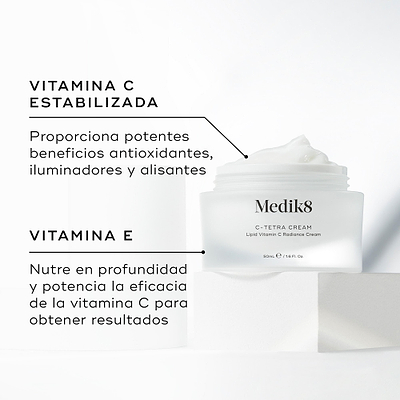El tarro de C-Tetra Cream aparece abierto sobre un bloque de piedra blanca, en un fondo blanco limpio. La imagen destaca dos ingredientes clave y sus beneficios:

VITAMINA C ESTABILIZADA: aporta potentes beneficios de alisado, luminosidad y acción antioxidante.

VITAMINA E: nutre en profundidad y potencia la acción de la vitamina C para obtener resultados máximos.
