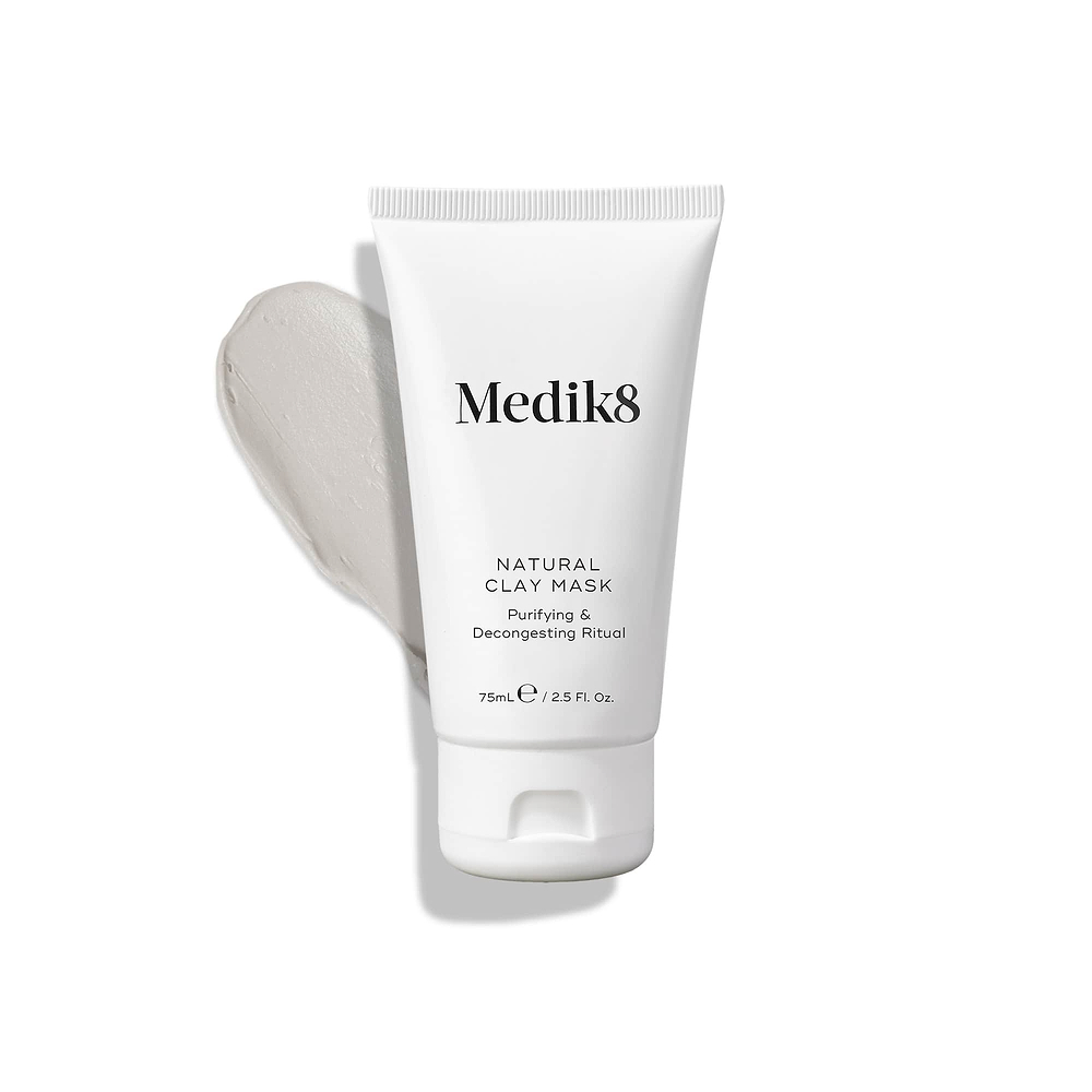 Natural Clay Mask stands upright, with a swatch of light grey clay mask beside it.