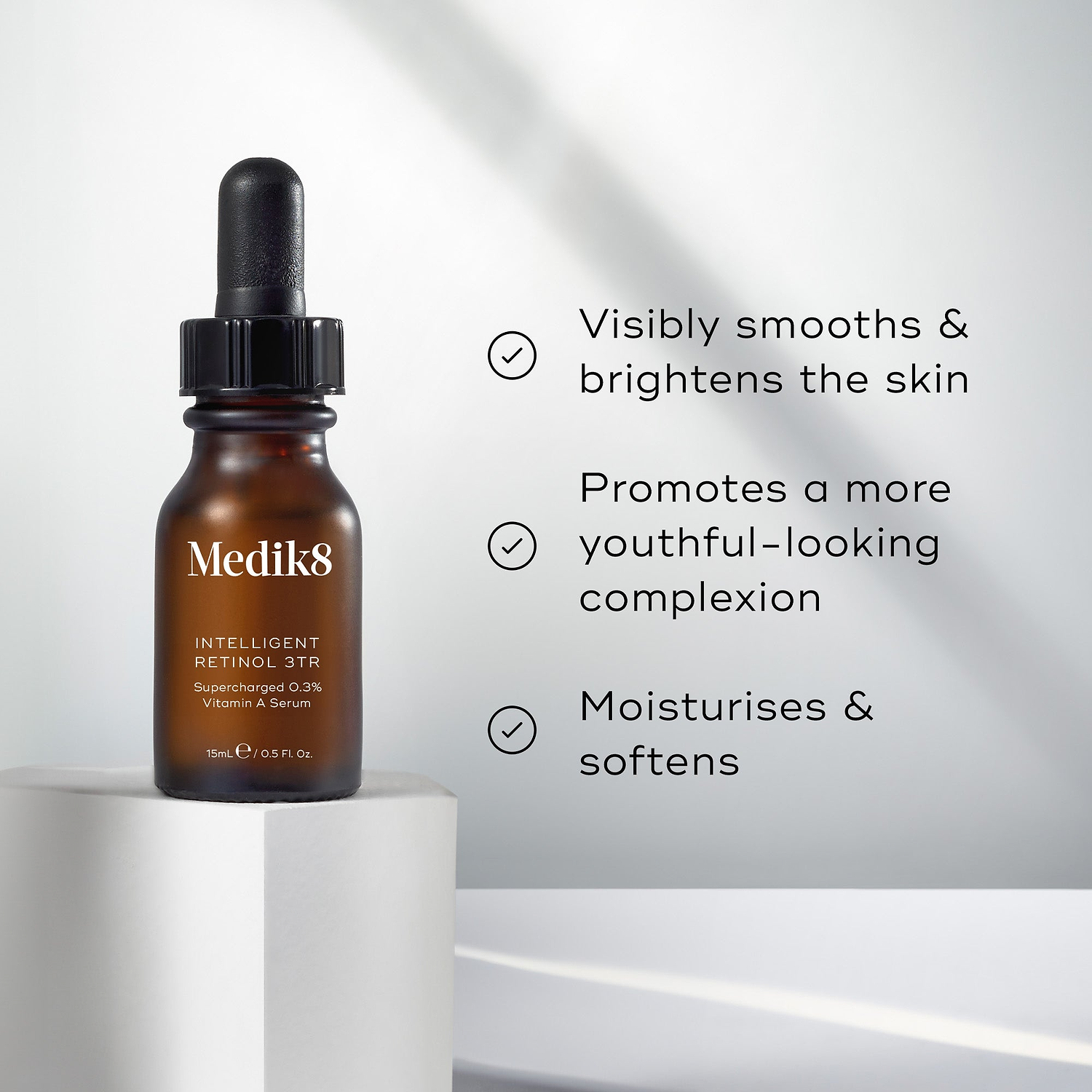 A brown glass dropper bottle of Intelligent Retinol 3TR is featured. Three bullet points with checkmarks list benefits: Visibly smooths & brightens the skin, Promotes a more youthful-looking complexion, and Moisturises & softens.