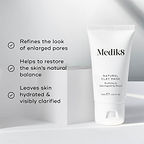 Natural Clay Mask is featured on a white geometric block. Three bullet points with checkmarks list benefits: Refines the look of enlarged pores, Helps to restore the skin's natural balance, and Leaves skin hydrated & visibly clarified.