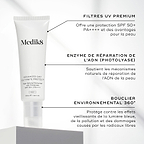 Un tube blanc d’Advanced Day Ultimate Protect est présenté. Des encadrés de texte mettent en avant les ingrédients clés : FILTRES UV PREMIUM, ENZYME DE RÉPARATION DE L’ADN et PROTECTION ENVIRONNEMENTALE À 360°.
