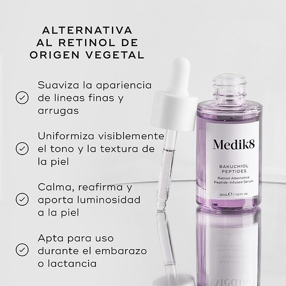 Se muestra un frasco cuentagotas de vidrio morado del sérum Bakuchiol Peptides con su cuentagotas. A la izquierda, el texto destaca el producto como una “ALTERNATIVA VEGETAL AL RETINOL” con beneficios que incluyen:

Suavizar líneas finas y arrugas
Unificar visiblemente el tono y la textura de la piel
Calmar, rellenar e iluminar la apariencia de la piel
Ser apto para su uso durante el embarazo y la lactancia-hover-31