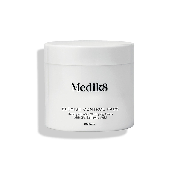 Medik8 Blemish Control Pads jar stands against a clean white background. Text identifies the product as "Ready-to-Go Clarifying Pads with 2% Salicylic Acid" containing 60 pads.-54