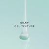 Silky gel texture. The animation shows a thick, translucent teal gel pouring down into a smooth pool.
