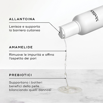 Dal flacone del Daily Refresh Balancing Toner scorre del liquido. Il testo evidenzia l’Allantoina per lenire, l’Amamelide per affinare i pori e i Prebiotici per bilanciare i batteri della pelle.