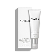 Een witte tube Calmwise Colour Correct (50 ml) staat naast de bijbehorende witte kartonnen verpakking.